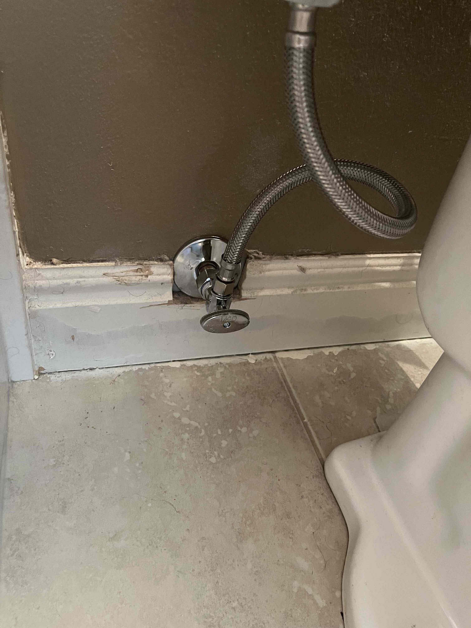 Image depicting a reliable plumber performing routine plumbing maintenance, highlighting plumbing maintenance services for homes and businesses.