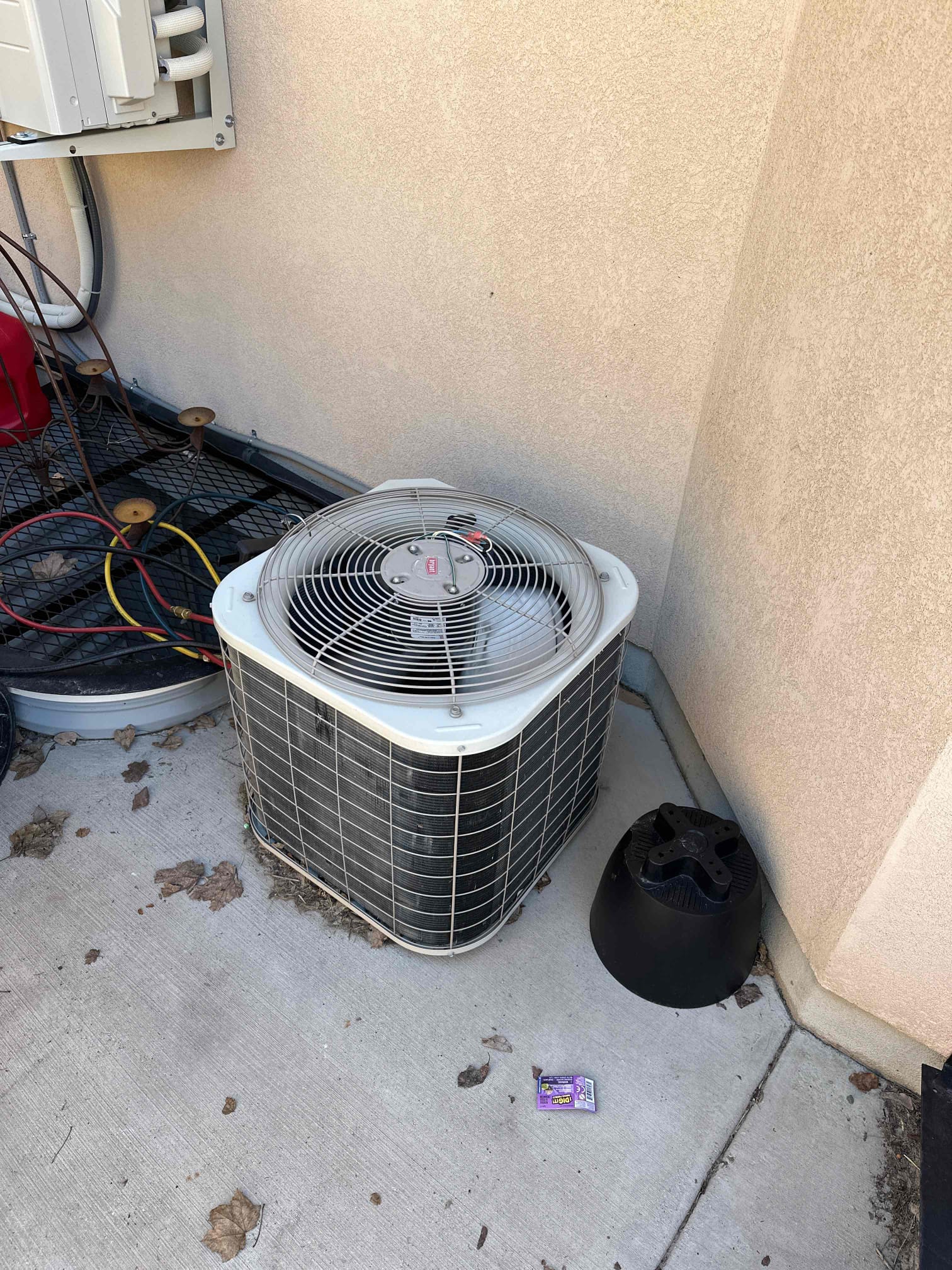 Image depicting AC repair services, possibly showcasing a technician working on a window AC unit. Could relate to 'AC maintenance near me' by implying local service availability.