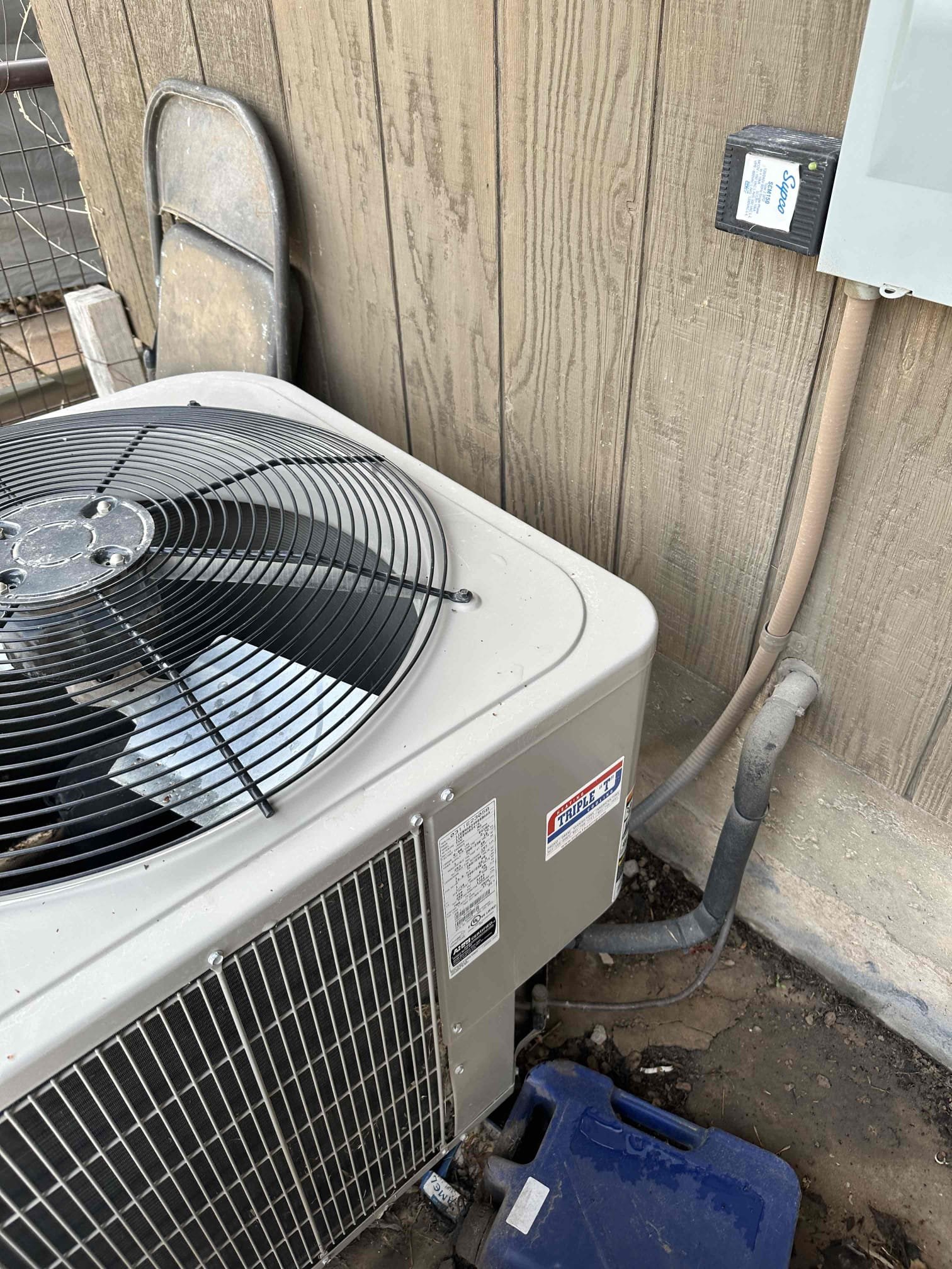 A modern electric space heater warming a cozy living room. Consider electric heat as a cost-effective solution if your home's heating system is failing. Schedule a residential heating inspection to explore energy-efficient options and ensure safe operation.