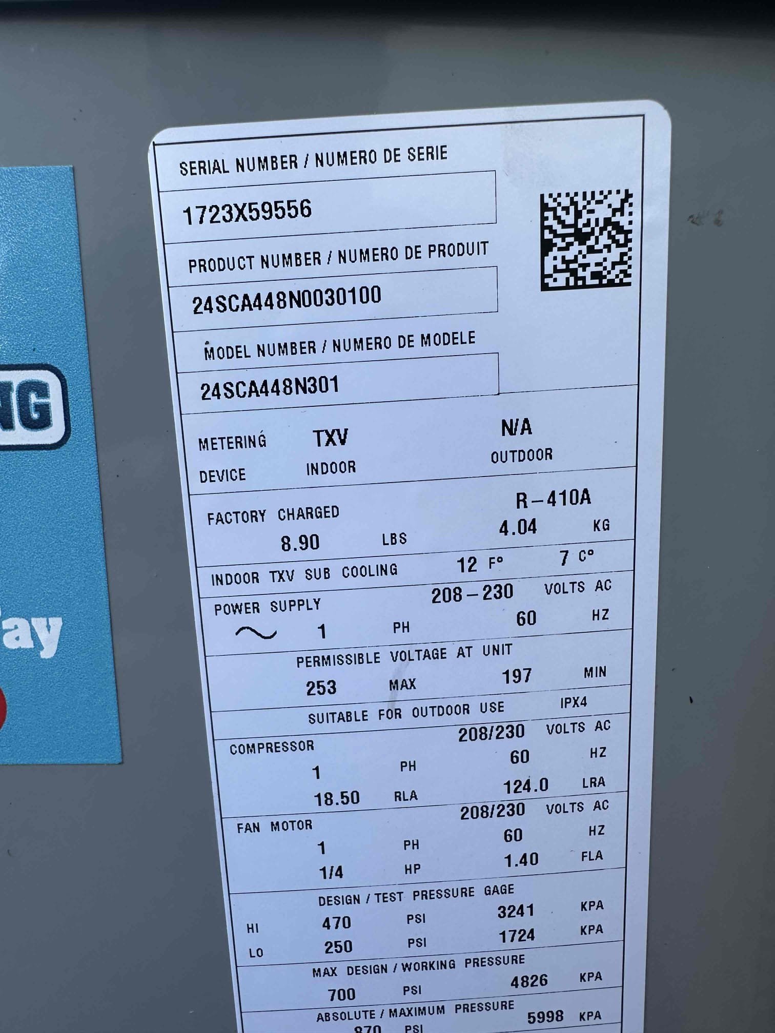 Professional HVAC technicians expertly install industrial air conditioning, similar to window AC or standard AC unit installations, ensuring efficient climate control for commercial spaces.