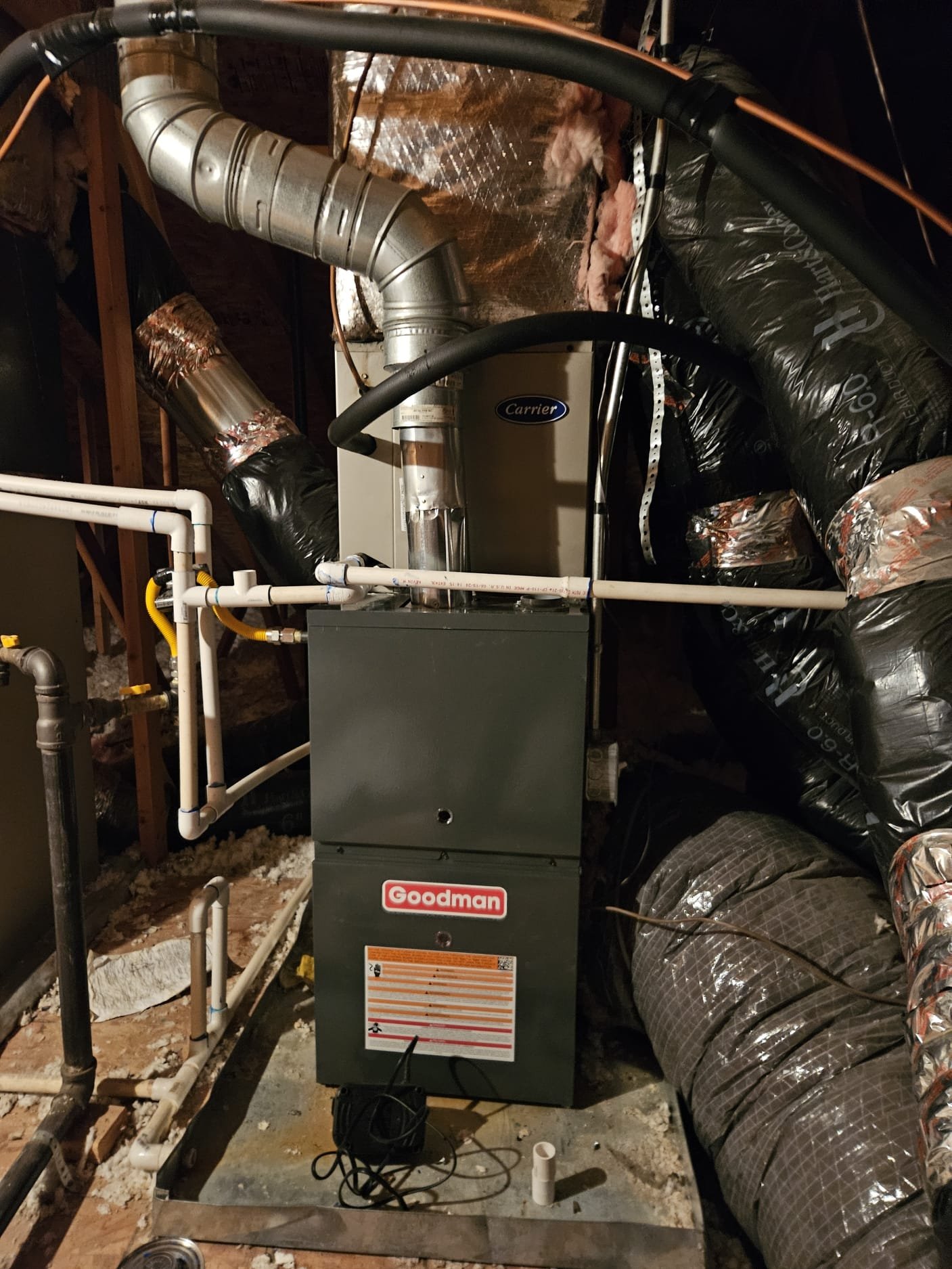 DIY furnace installation showing a new furnace being installed. Consider professional Lennox furnace installation for optimal performance and to understand the Lennox furnace installation cost.