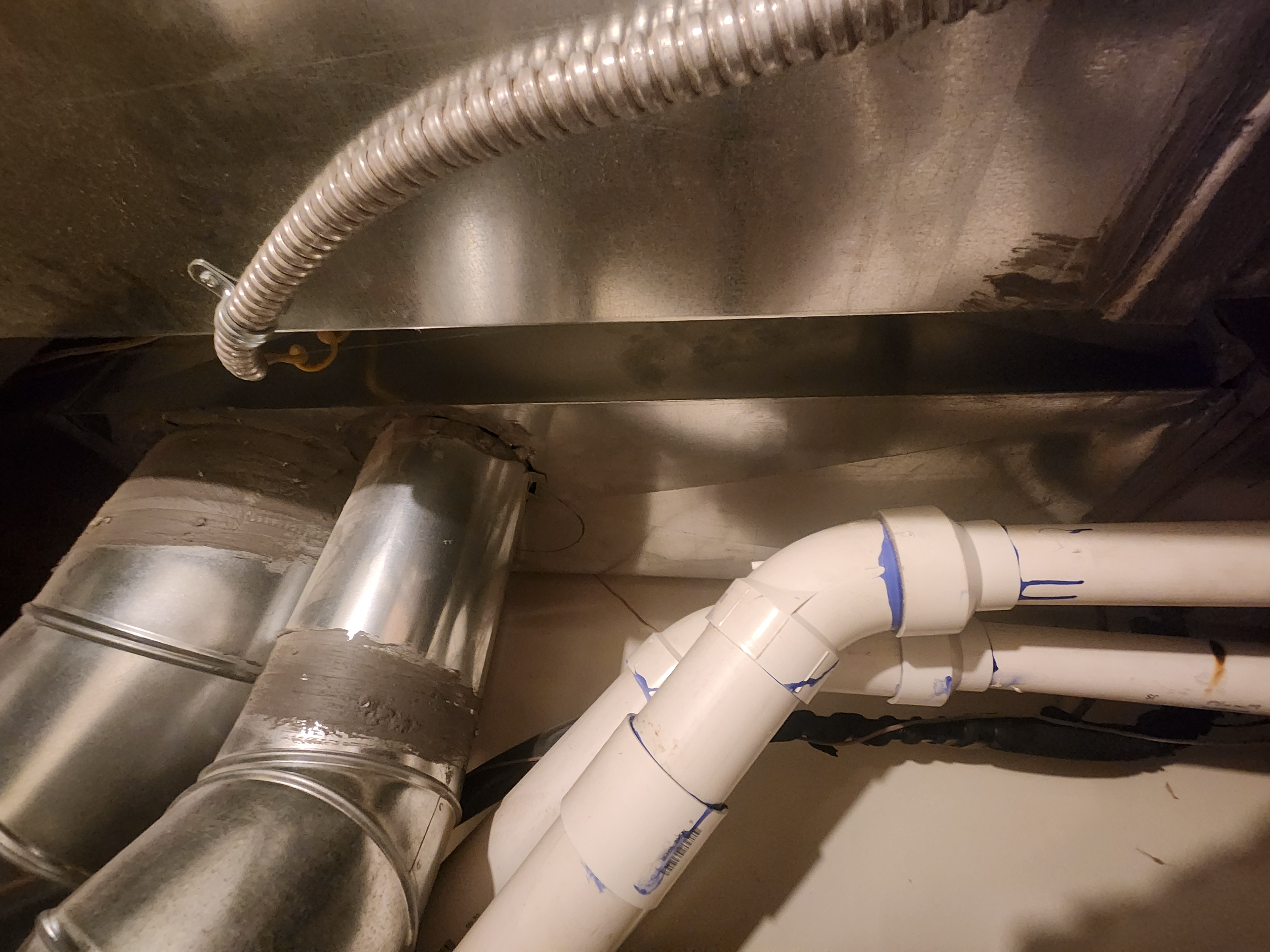 Image of household water softener units for homes, highlighting their role in preventing hard water damage and the need for potential repair residential drywall water damage remediation. An essential appliance for maintaining a healthy home and protecting against costly water damage.