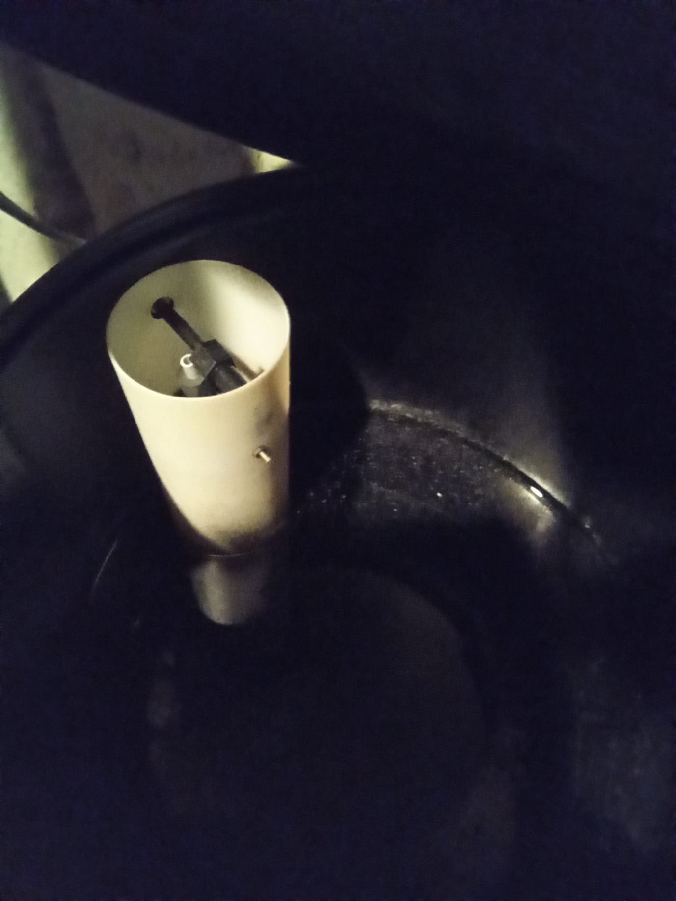 Image depicting residential bathroom mold cleanup, potentially showing troubleshooting steps or inspection. Conceptually linked to home remedies for clogged kitchen sinks, indicating a focus on DIY home maintenance and problem-solving for common household issues.