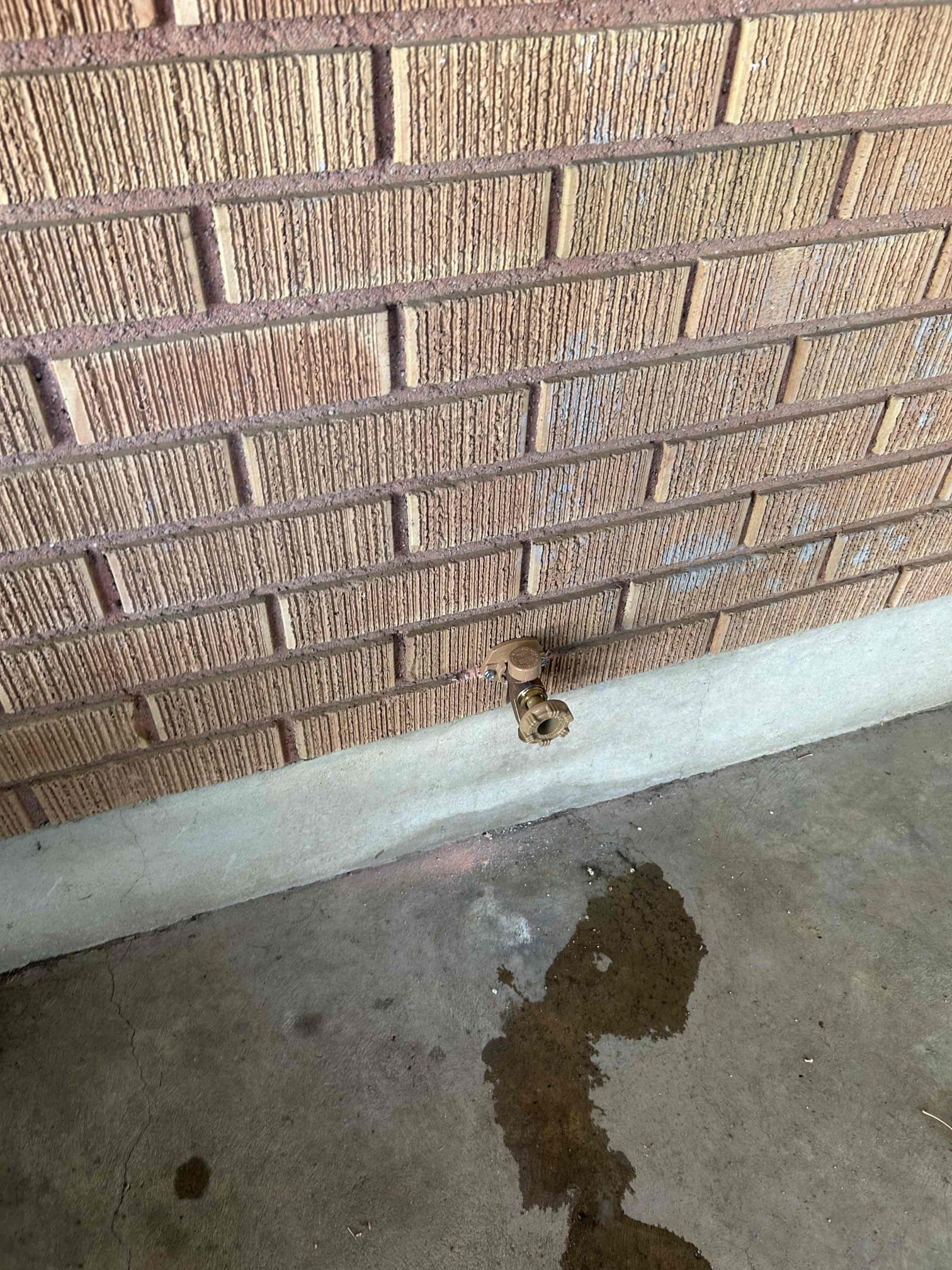 Water-stained basement ceiling after water damage, possibly linked to a faulty water softener system used with well water. Seeking 24-hour emergency restoration services to repair the ceiling and address the source of the leak.