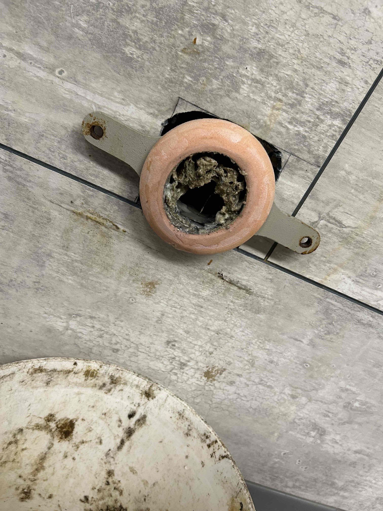 Image of a commercial bathroom undergoing affordable mold repair. Focus on key commercial bathroom equipment like sinks and stalls, highlighting the mold remediation process. A visual representation of commercial bathroom mold repair troubleshooting and cost-effective solutions.