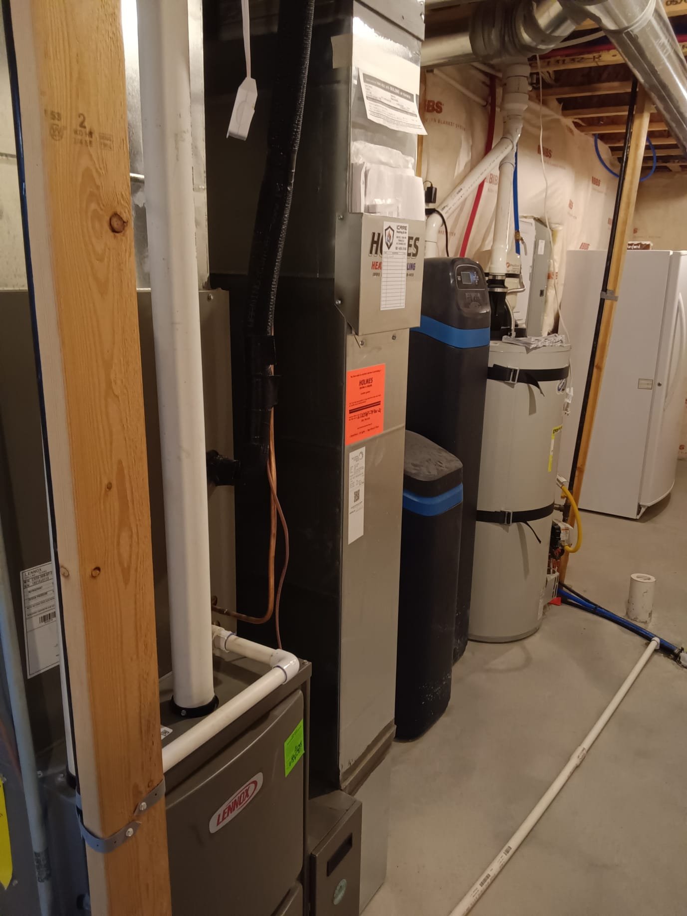 A water filter system, capable of desalinating water, is displayed. This highlights solutions for water issues, from basement water removal to providing potable water like a small hot water heater provides hot water.