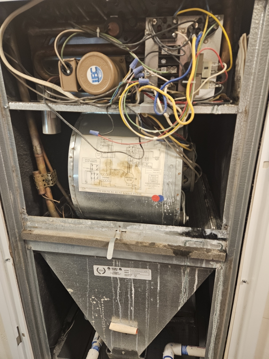 A cheap borescope inspecting the internal components of a residential electric boiler. Useful for residential boiler service and troubleshooting potential issues in hard-to-reach areas.