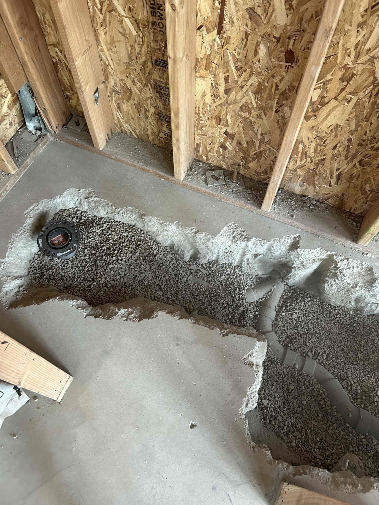 Image depicting the assessment or cleanup process following a commercial sewage backup, highlighting the importance of regular sewage tank maintenance for preventing such incidents. Could show a technician diagnosing the problem, cleanup crews in action, or equipment used for sewage removal and sanitation. Emphasizes the need for professional commercial sewage backup cleanup diagnosis and solutions.