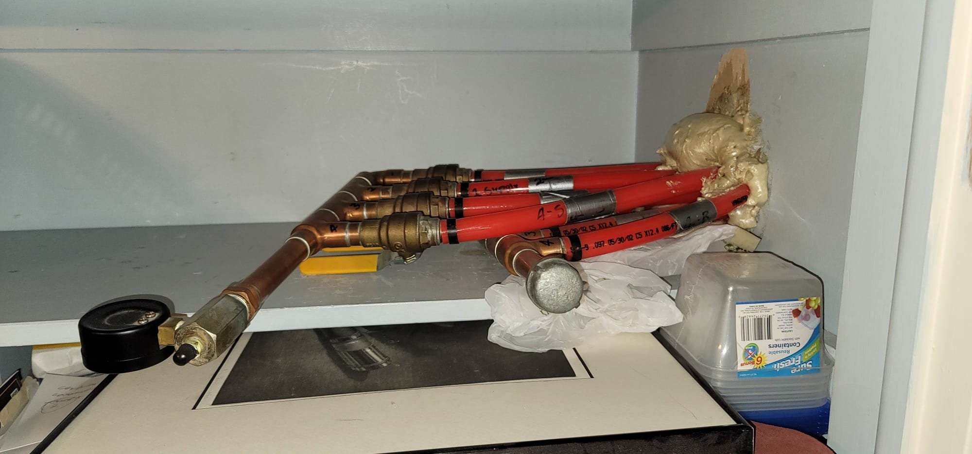 A clogged double kitchen sink, symbolizing household plumbing issues that, like an inefficient boiler, can disrupt home comfort. Consider a high-efficiency residential boiler and consult a residential boiler diagram for optimal home heating solutions.