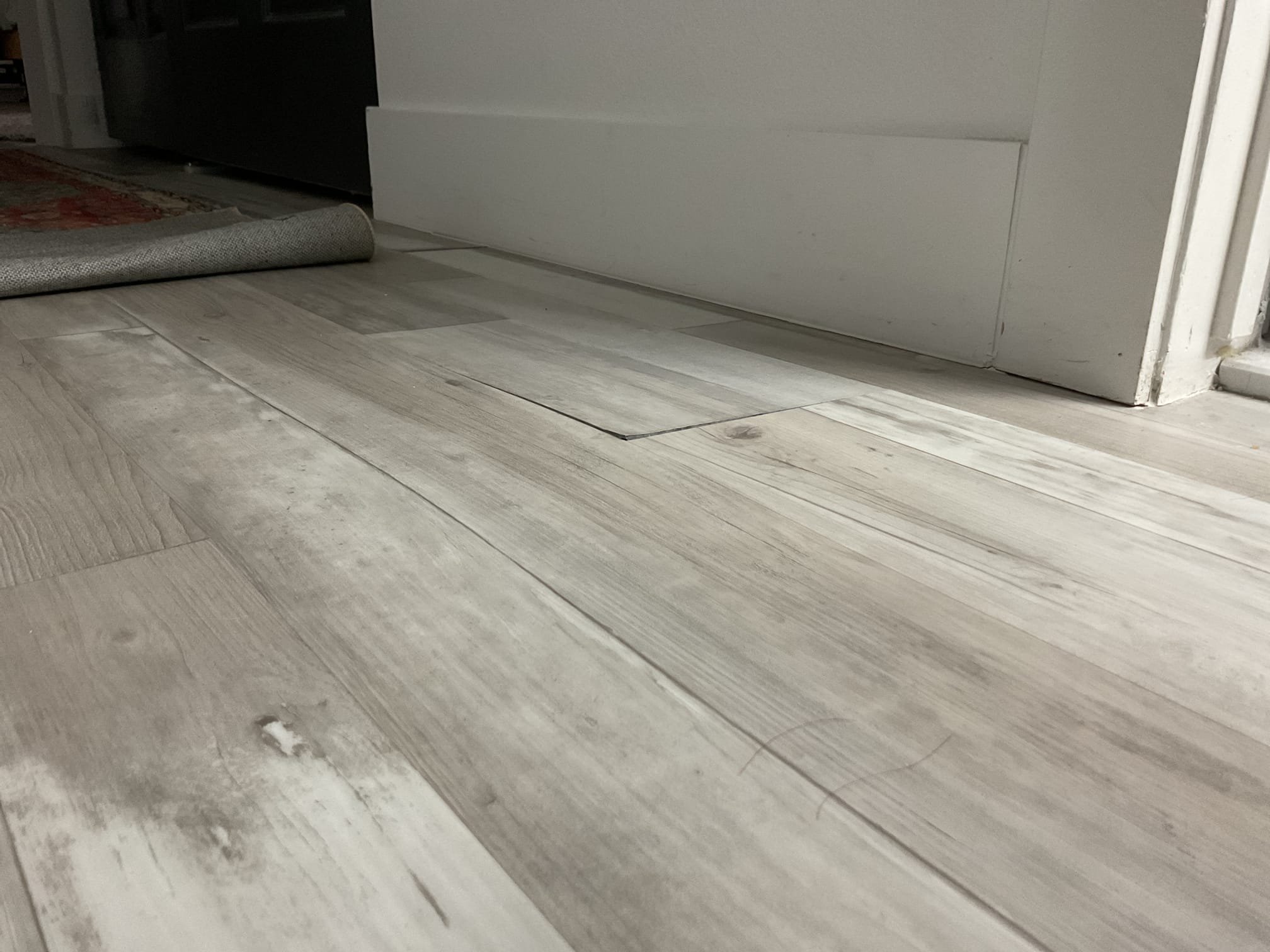 Residential bathroom mold damage inspection due to a stinky bathroom sink, highlighting the need for professional mold remediation services.