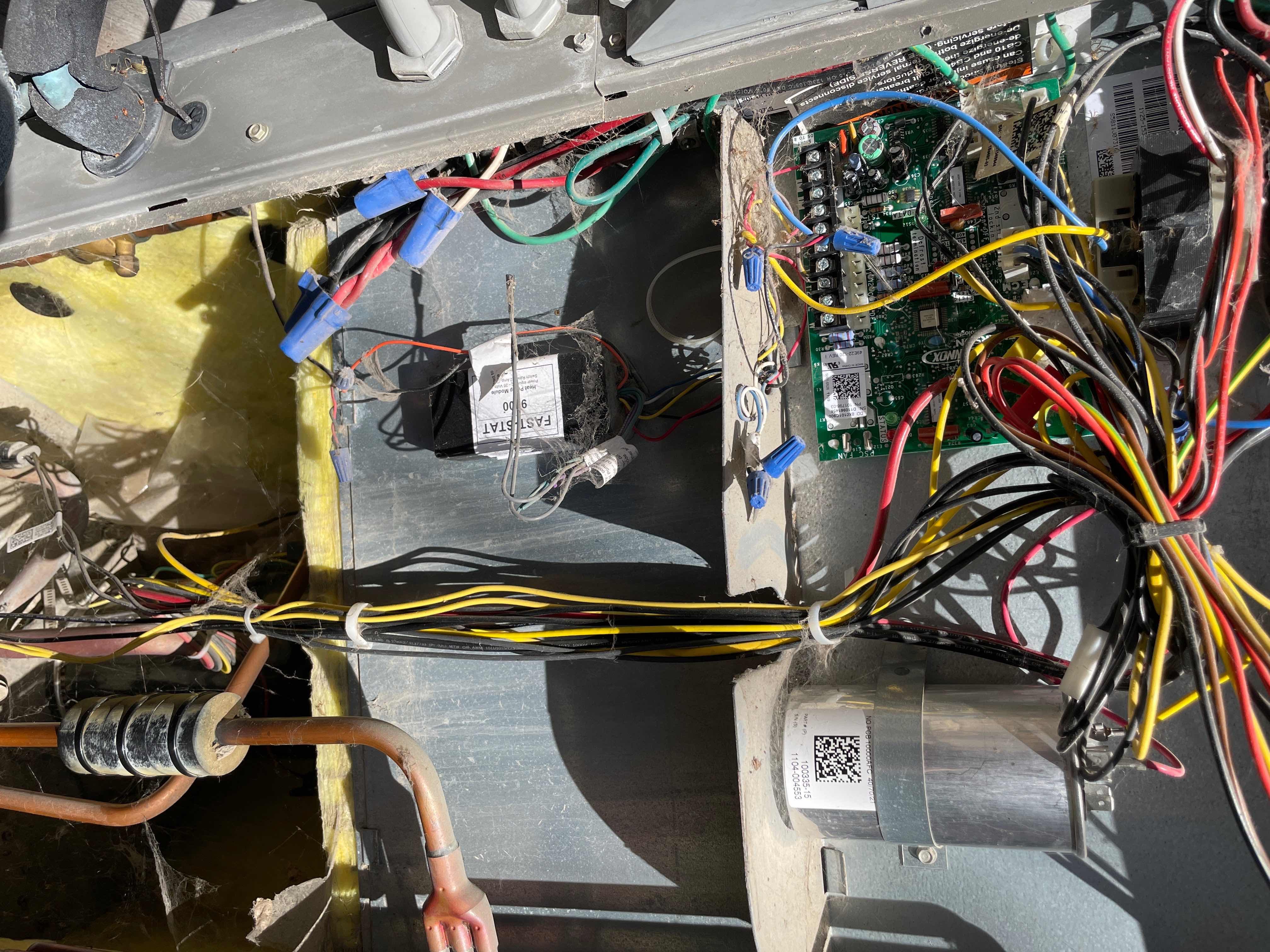 A mobile home furnace undergoing repair, symbolizing the importance of regular furnace tune-ups and quick access to Goodman furnace repair services nearby for efficient and reliable heating solutions.