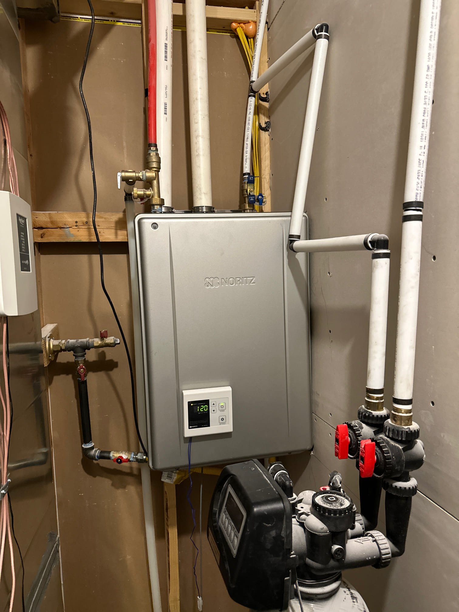 Image of air conditioning and heating units, representing comprehensive HVAC services. Find local water heater installation and expert heating and cooling solutions near you.