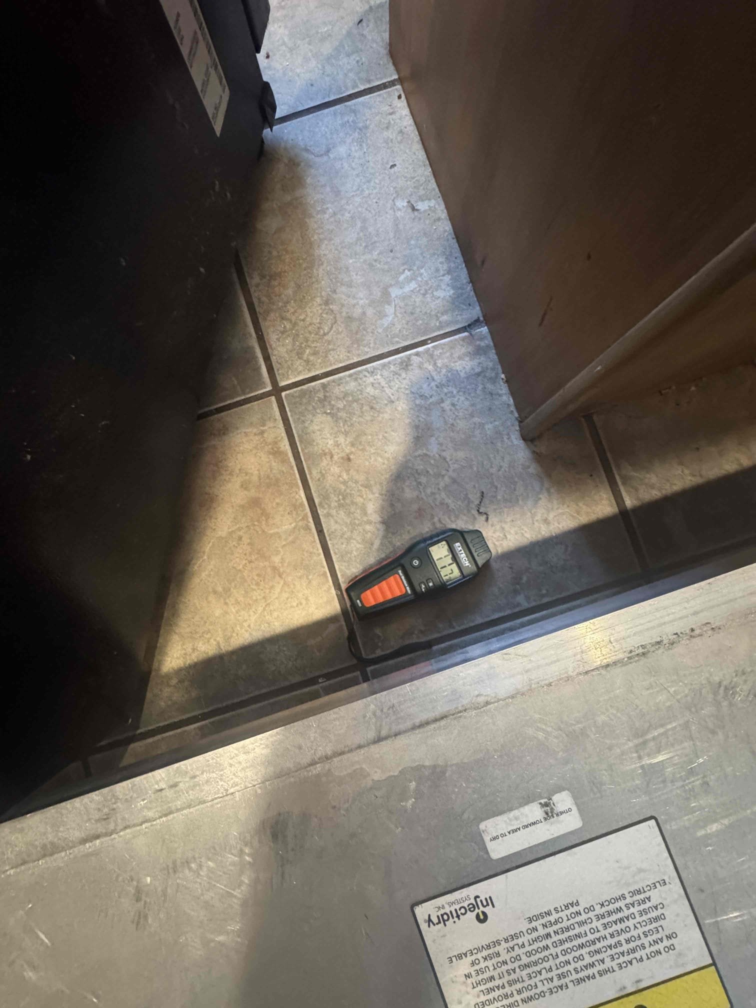 Image depicting residential sewage backup restoration, highlighting the importance of preventing costly damage. Regular backflow testing can help avoid these messy situations and protect your home. Professional sewage cleanup services are essential for a safe and thorough restoration after a backup.