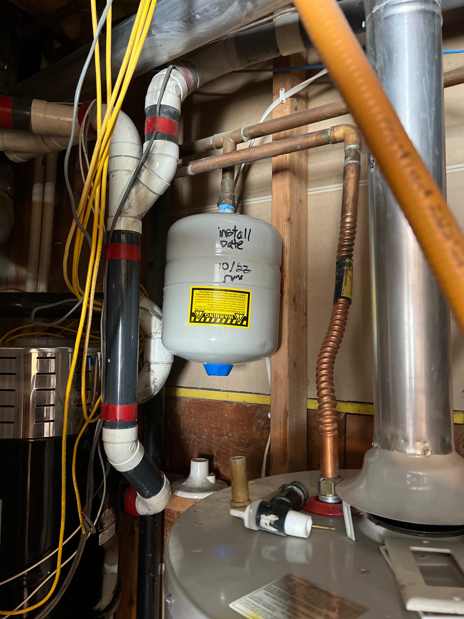 Close-up of a kitchen tap water filter attached to a kitchen faucet, ensuring clean drinking water. Regular faucet inspection helps maintain optimal filter performance.