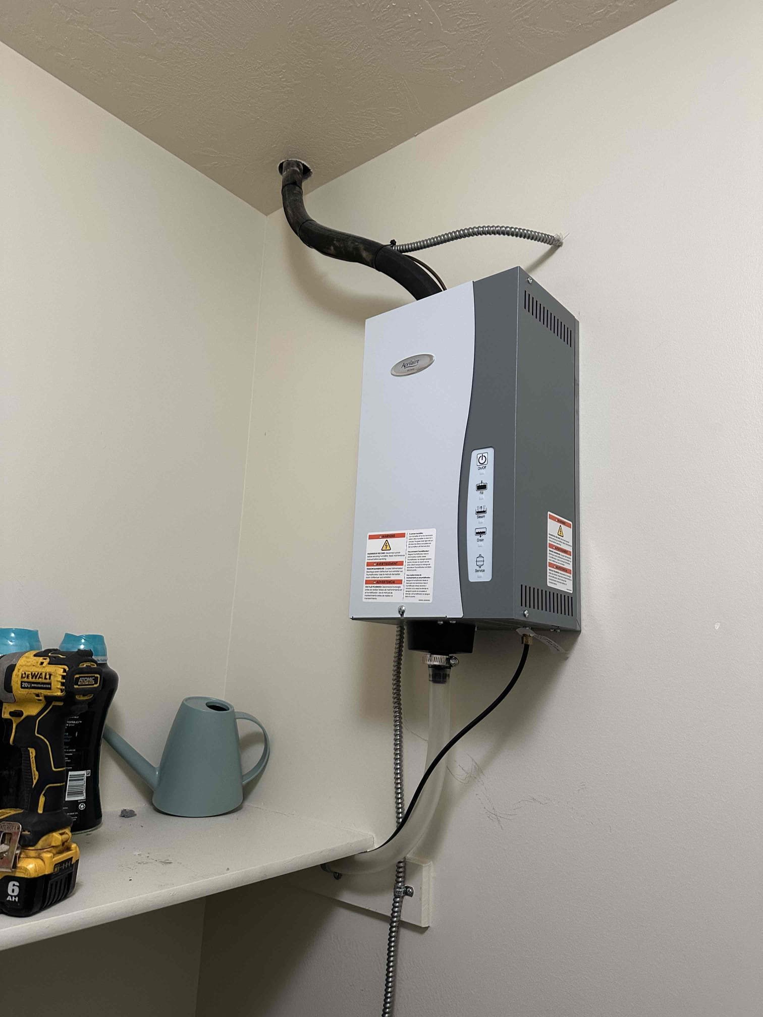 Image depicting tools, possibly including a sink removal tool, used for emergency residential flood odor removal. Focus is on professional services eliminating odors after a flood, ensuring a healthy home environment.