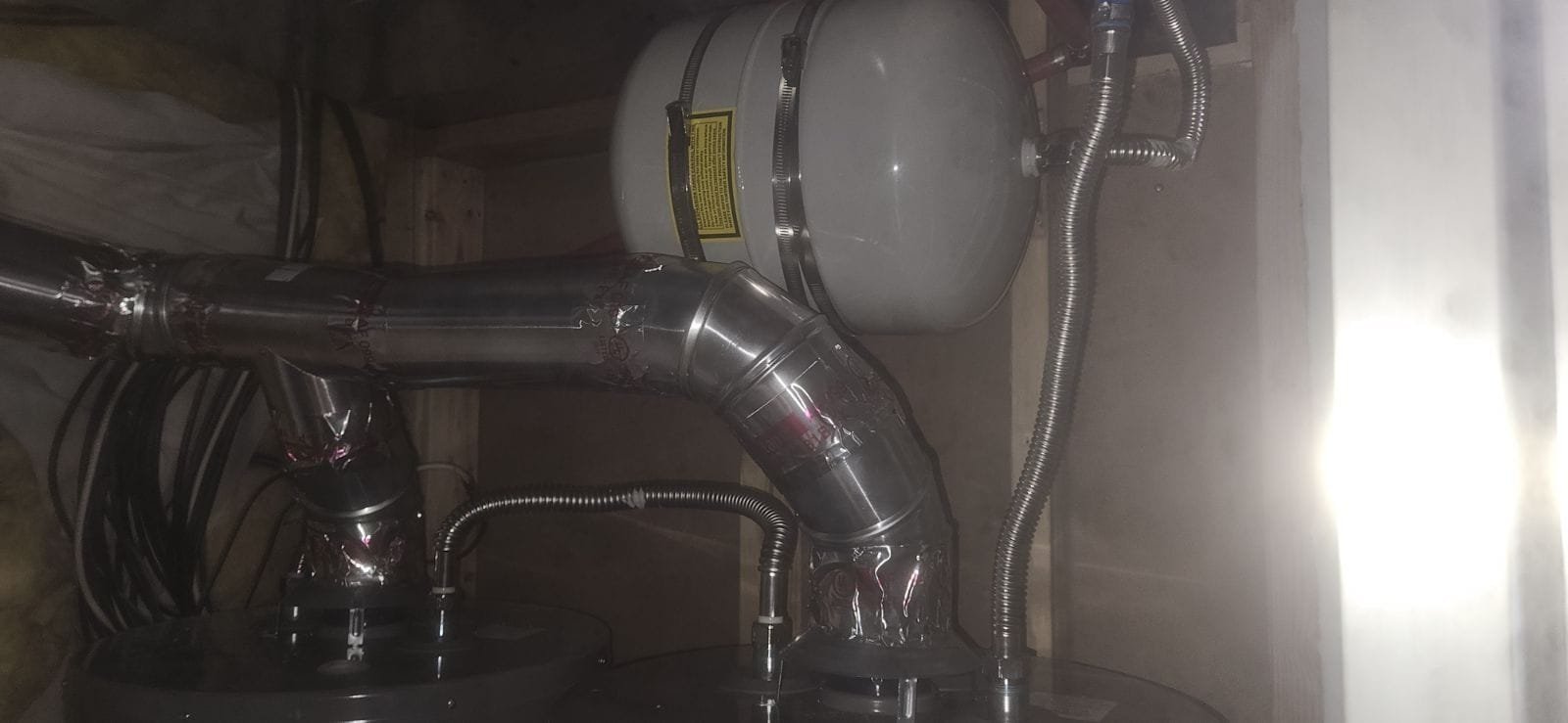 Image highlighting signs indicating a need for residential smoke cleanup, such as lingering odors and visible soot, with a subtle connection to bathroom exhaust fan cleaning and professional residential smoke cleanup services.