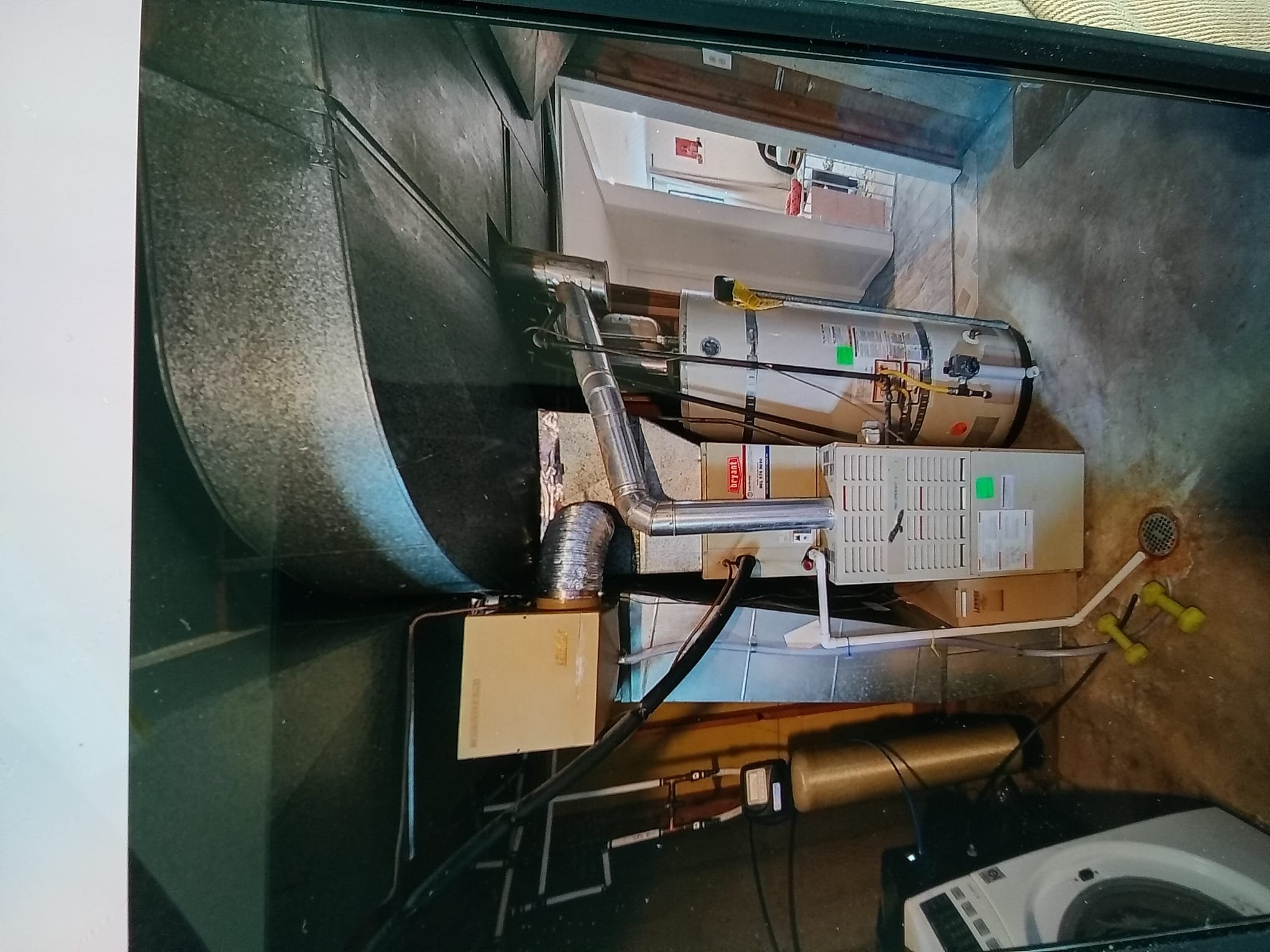 Image depicting central air conditioning replacement. Technicians are installing a new AC unit, highlighting central air replacement repair and the process of upgrading to a more efficient system.