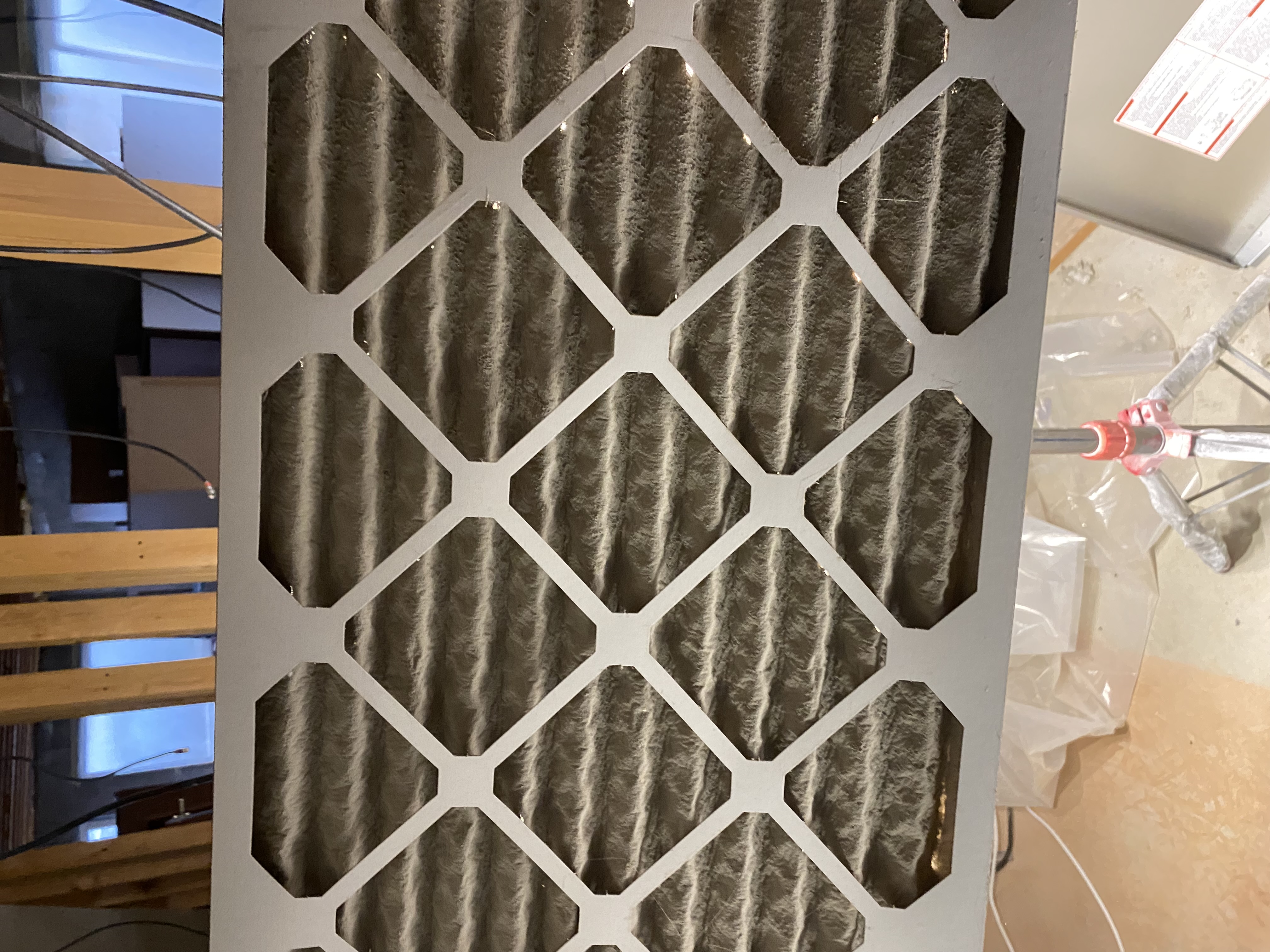 Frustrated homeowner checking water quality. Problem: No hot water. Could hard water or sediment buildup be the cause? Consider home water testing or free water testing near me to diagnose the issue and ensure optimal water heater performance.