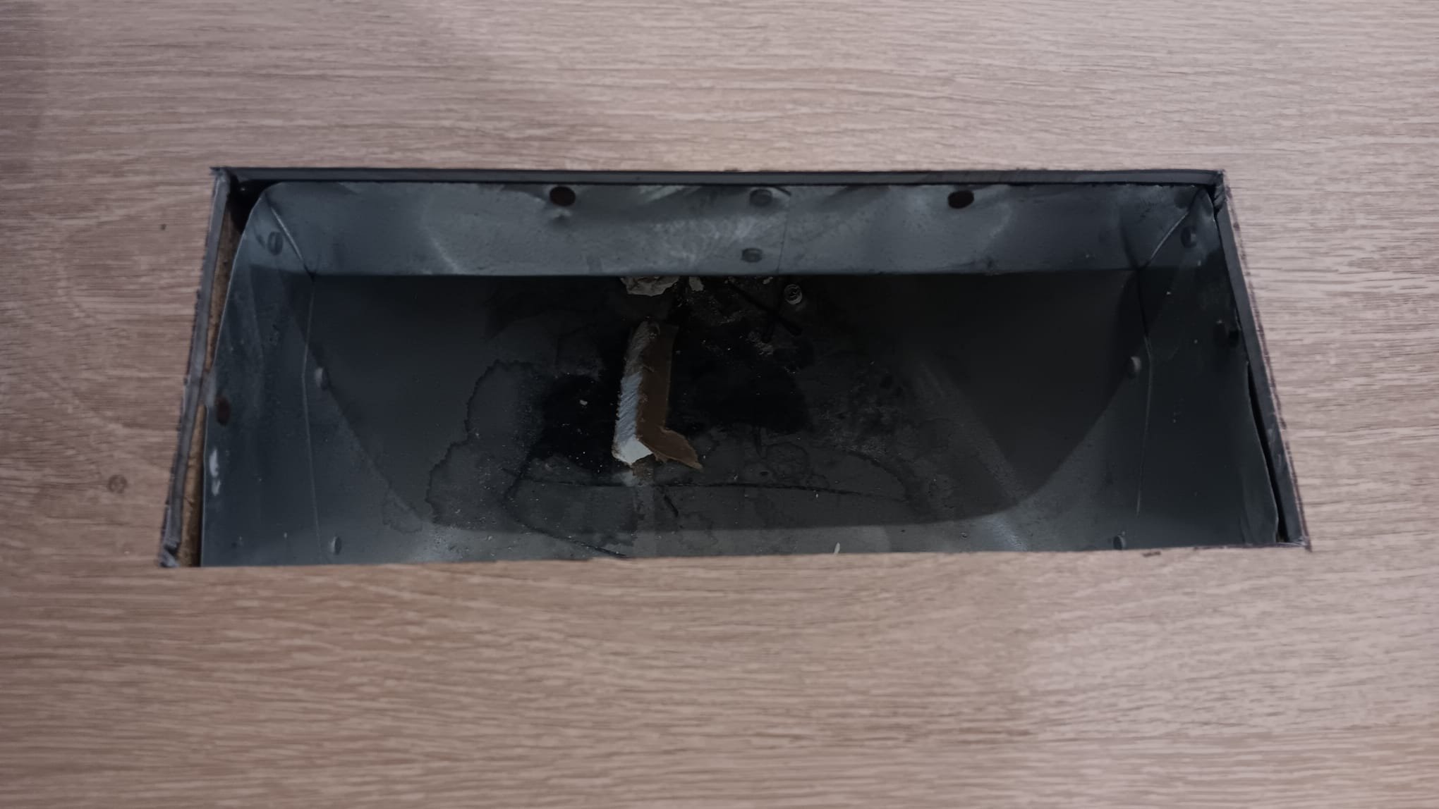 Image depicting the aftermath of a clogged disposal sink situation, highlighting the need for professional disaster cleaning companies specializing in water damage restoration and comprehensive cleanup services.