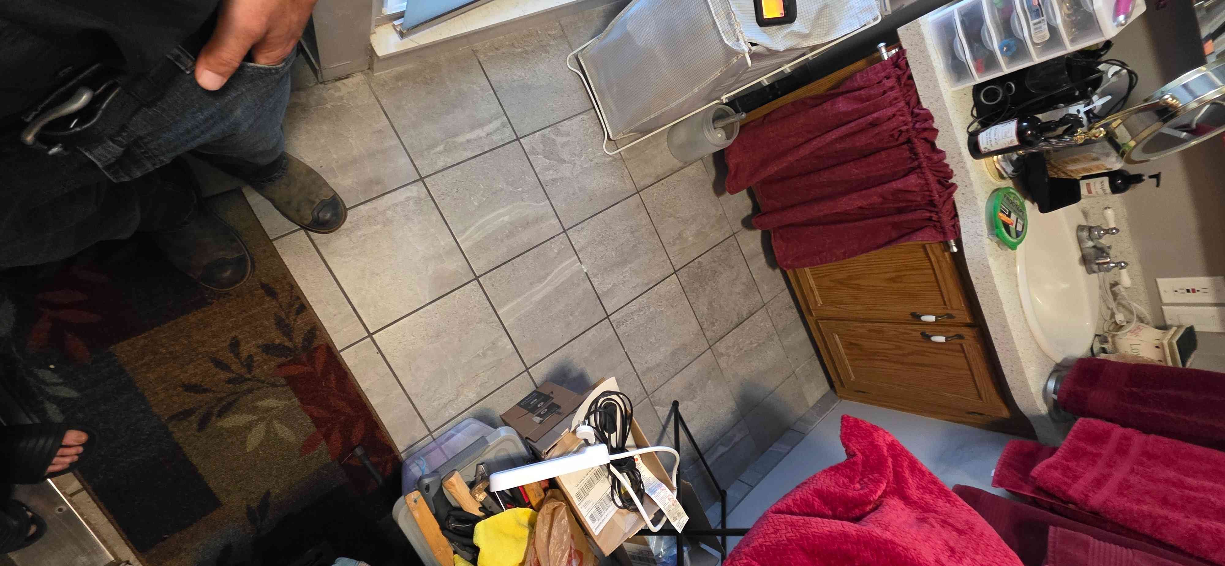 After hours residential water damage scene. Focus on the importance of water purifiers for clean water after a disaster. Search 'residential water damage near me' for immediate help.