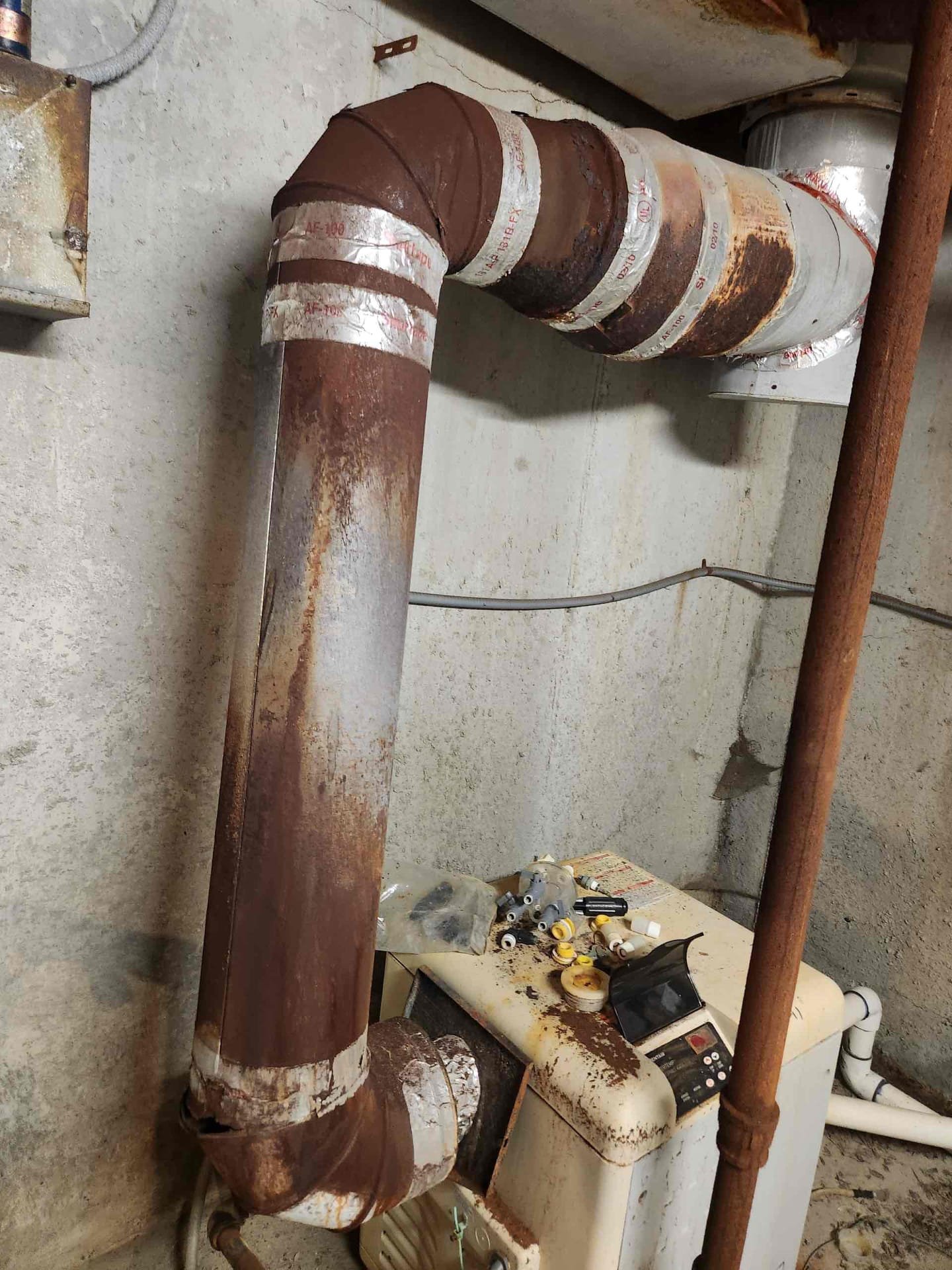 Image related to commercial repiping services, potentially showing elements of commercial heating systems or commercial heating and cooling repair work. Could depict pipes, HVAC units, or technicians working on a commercial system. Focus on keywords: commercial repiping, commercial heating systems, HVAC repair.