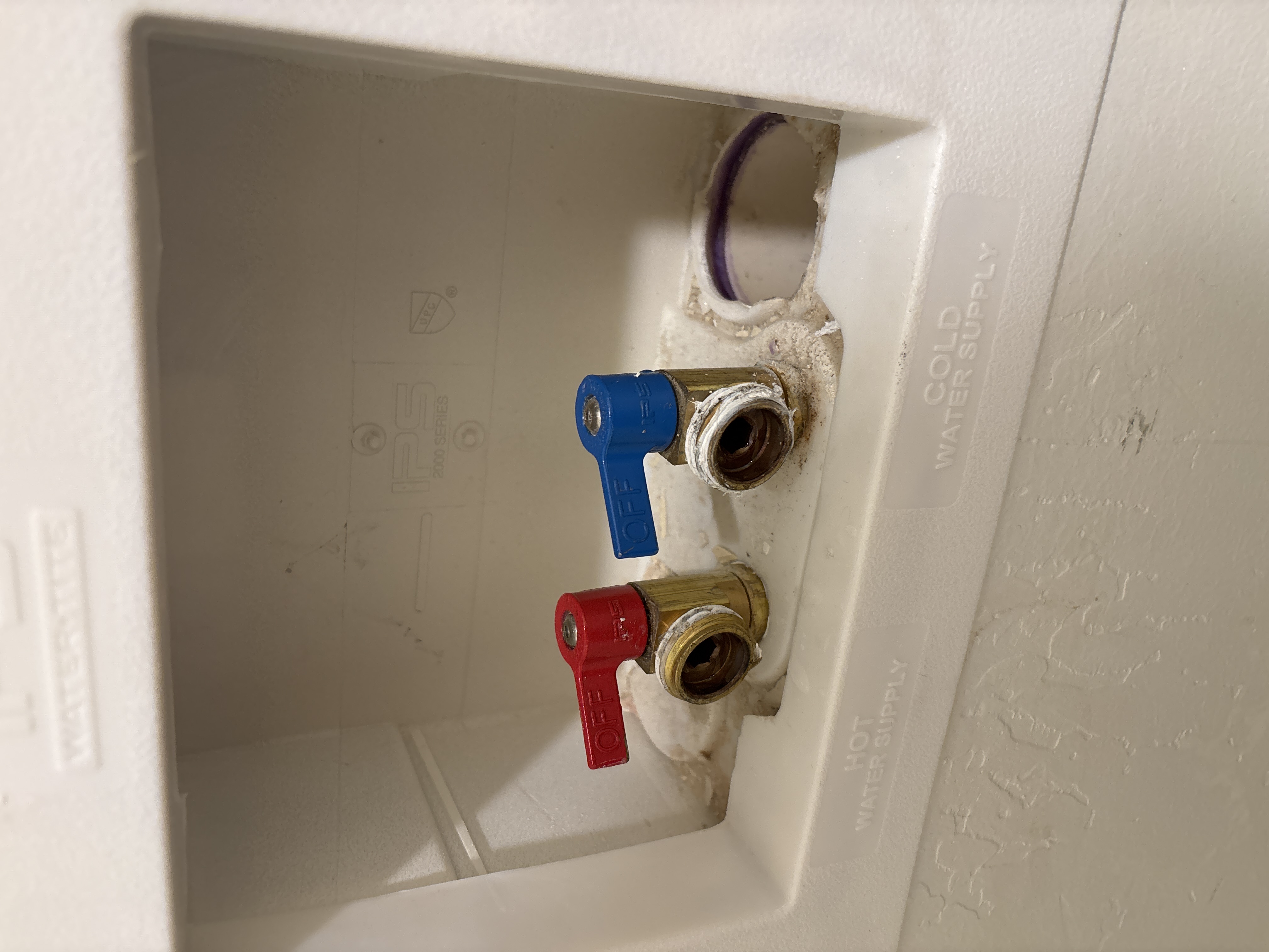 Image depicting basement drywall affected by water damage, highlighting the importance of regular maintenance, including dryer vent cleaning systems to prevent moisture buildup and potential water damage. Consider basement drywall water damage cleaning cost as a preventative measure.