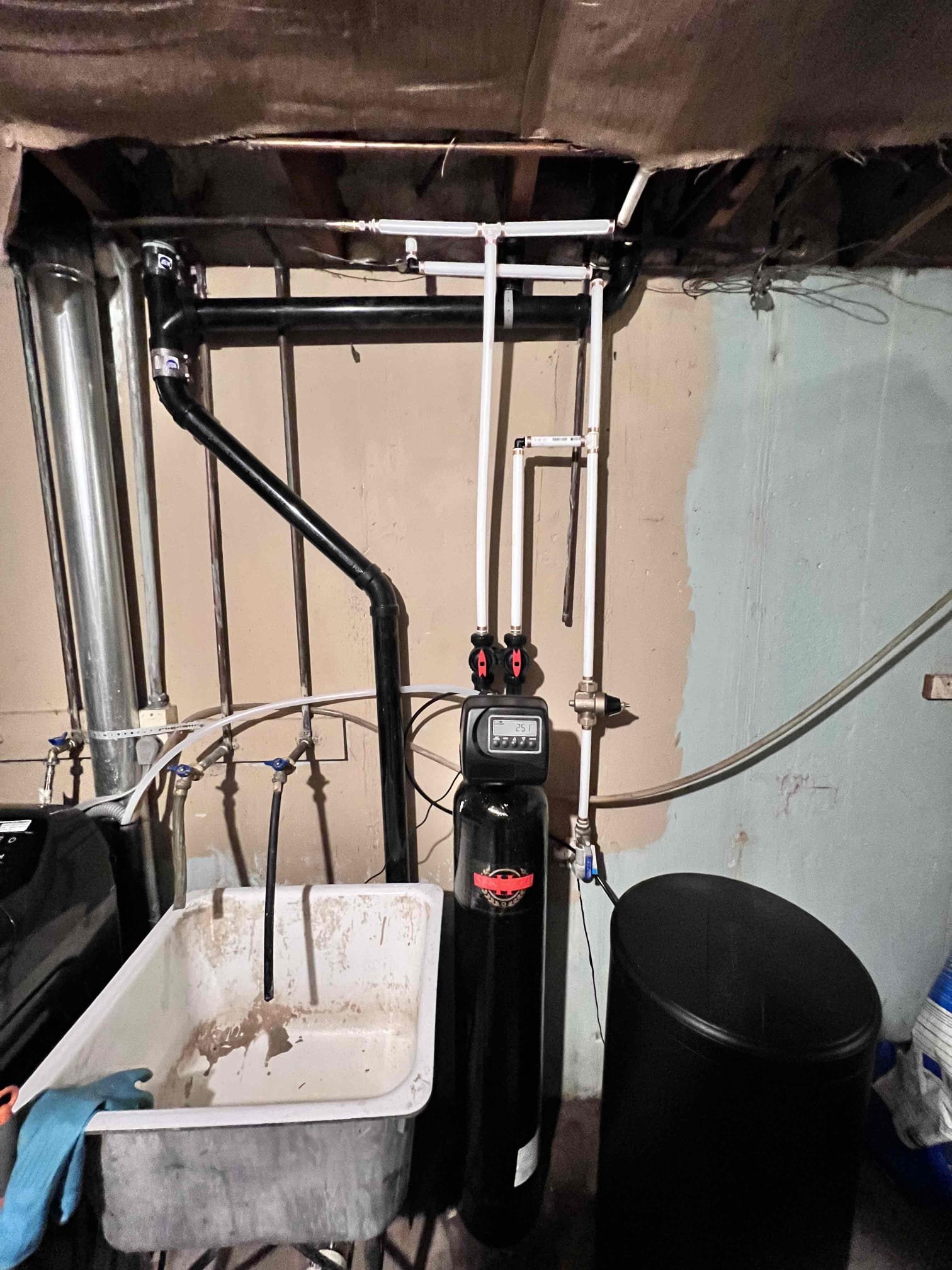 Image depicting residential water damage on drywall, hinting at cleaning costs and the importance of professional, licensed services. Related to maintaining a home, much like dryer vent cleaning prevents hazards and extra expenses.