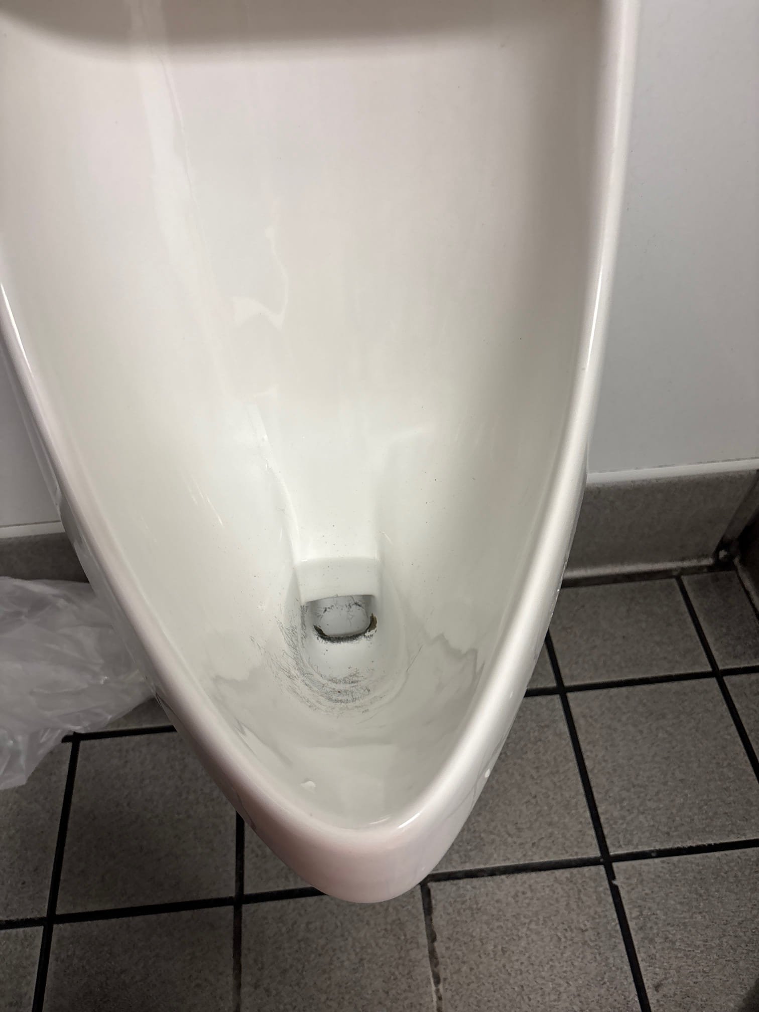 Inspection of commercial bathroom equipment for mold damage, crucial for ensuring hygiene and facilitating effective mold repair services.