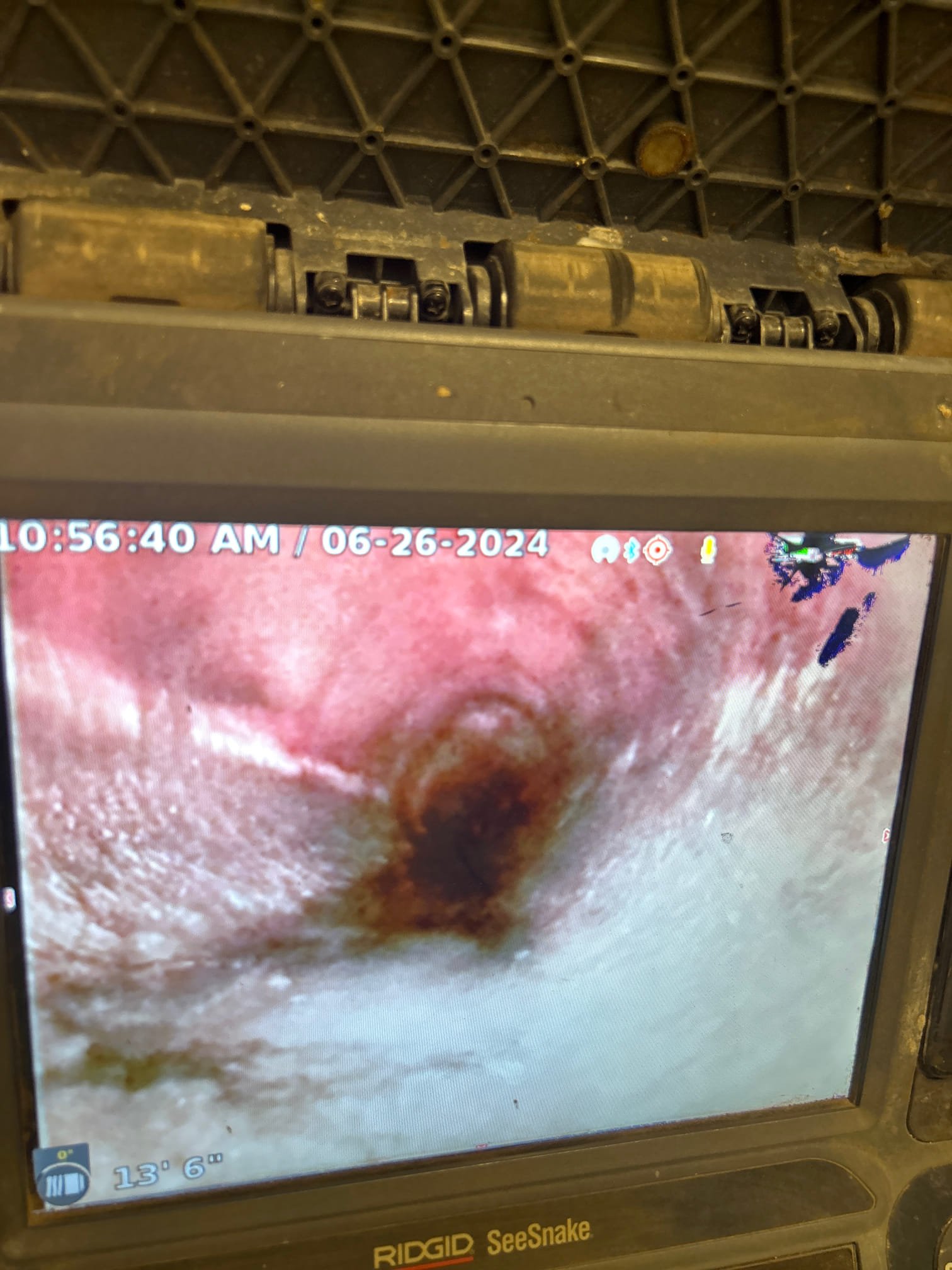 Image depicting drainage repair, possibly showcasing a plumber fixing a sink drain or using a drain cleaner. Relevant for searches like 'drain repair near me' and finding the 'best sink drain cleaner' for effective plumbing maintenance.