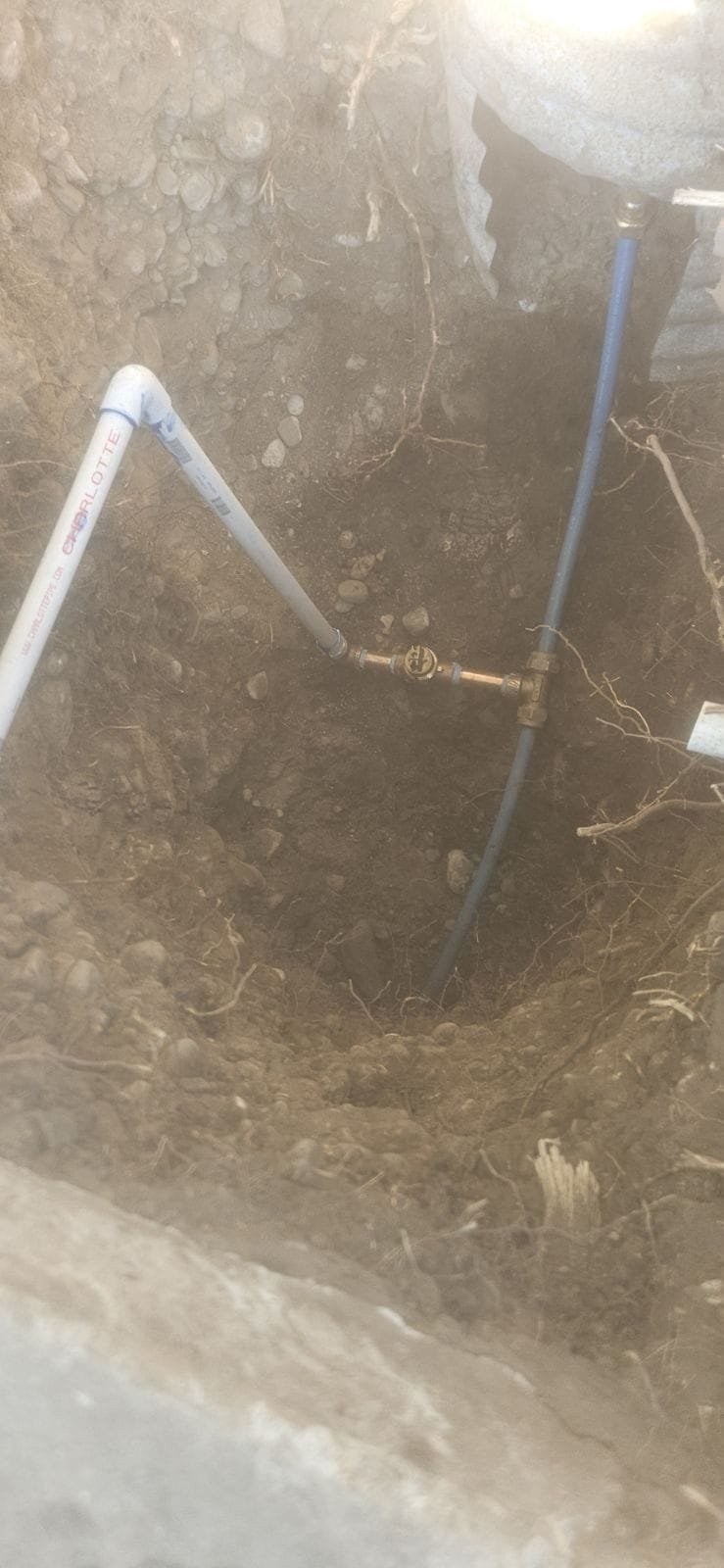 Ceiling water damage recovery underway after a clogged kitchen sink caused a leak. Insured repairs address the issue, though the process is noisy. The image depicts the aftermath of the plumbing problem and the efforts to restore the ceiling.