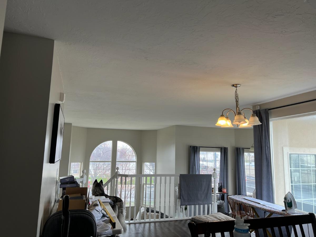 Image showing drywall repair after water damage, highlighting odor removal. Conceptually linked to clean water solutions like RO water filter installation to prevent future issues. Get a free drywall water damage odor removal estimate today!