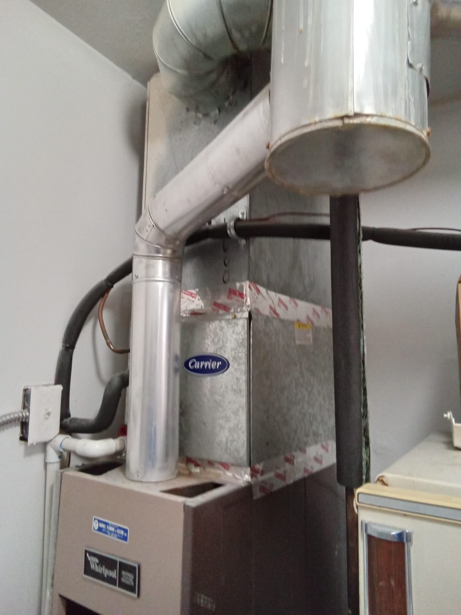 A plumber expertly repairs a leaky Pfister Pasadena faucet. This image highlights faucet repair plumbing, showcasing a common household fix.