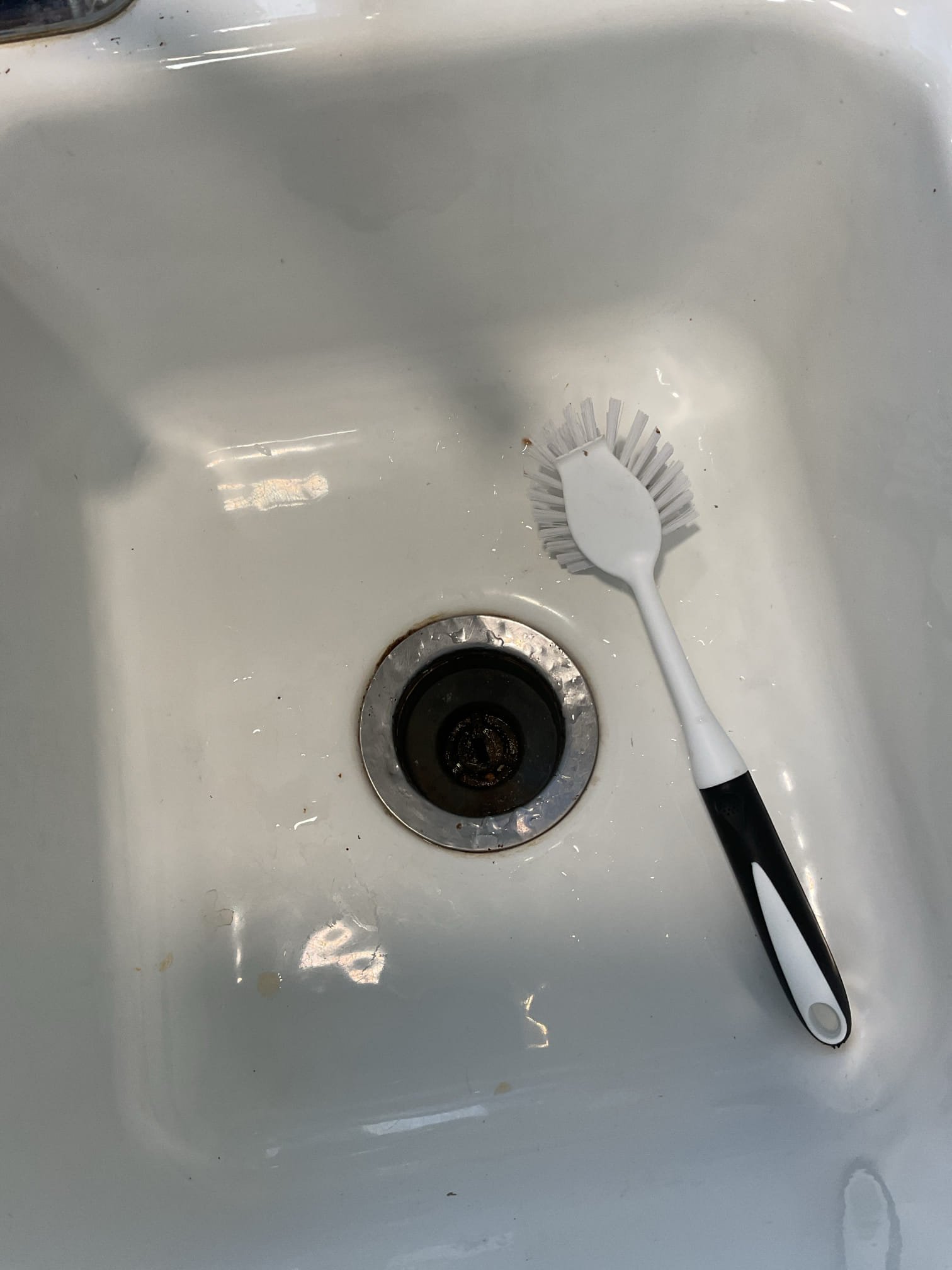 Image depicts flood cleaning efforts after a devastating flooding event. Focus is on the arduous task of property restoration and mitigating further damage from flooding.