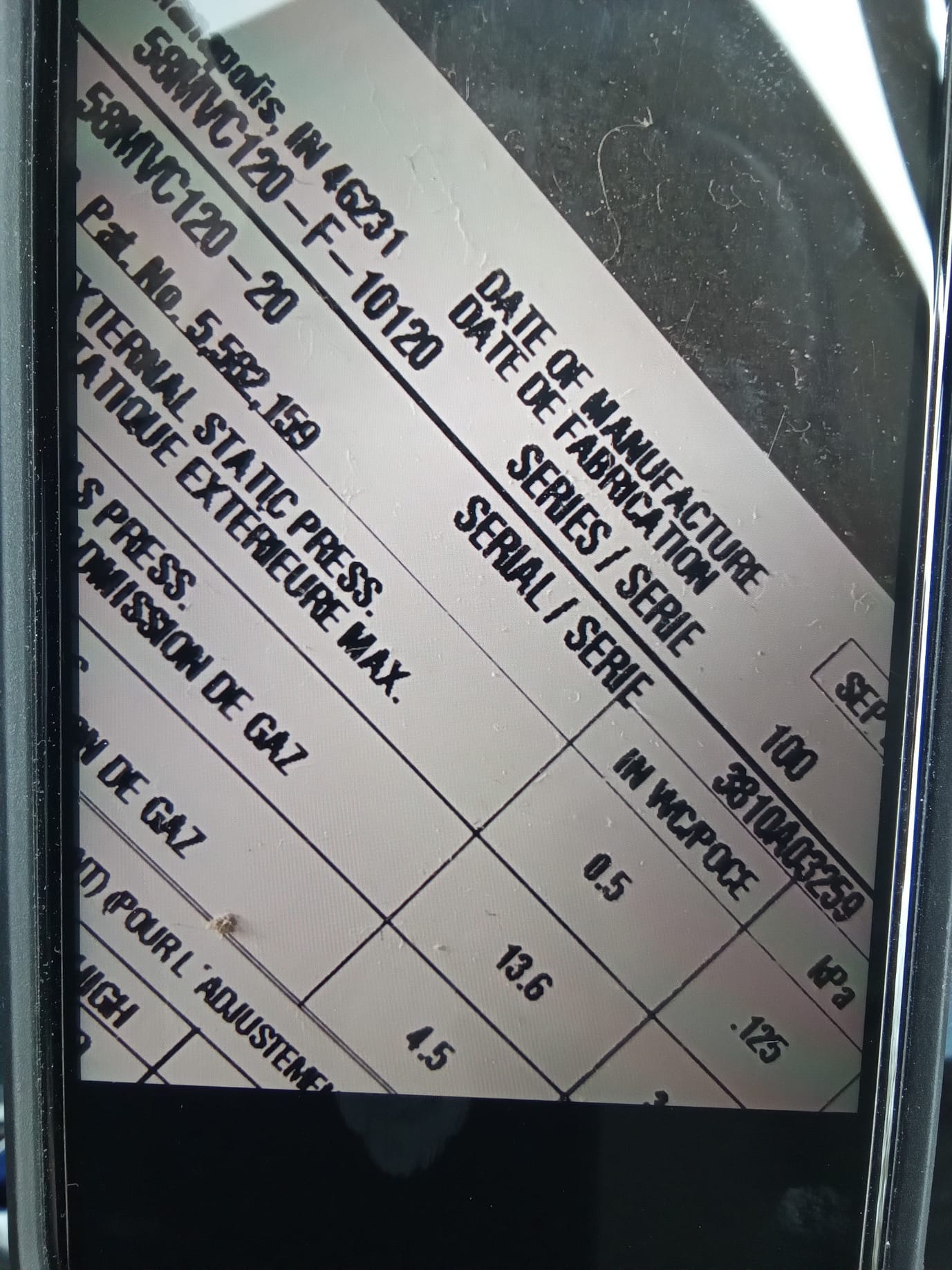 Close-up of a boiler pressure valve, a critical safety component in boiler heaters. This image highlights the importance of pressure relief in boiler systems, distinguishing them from furnaces and ensuring safe operation.
