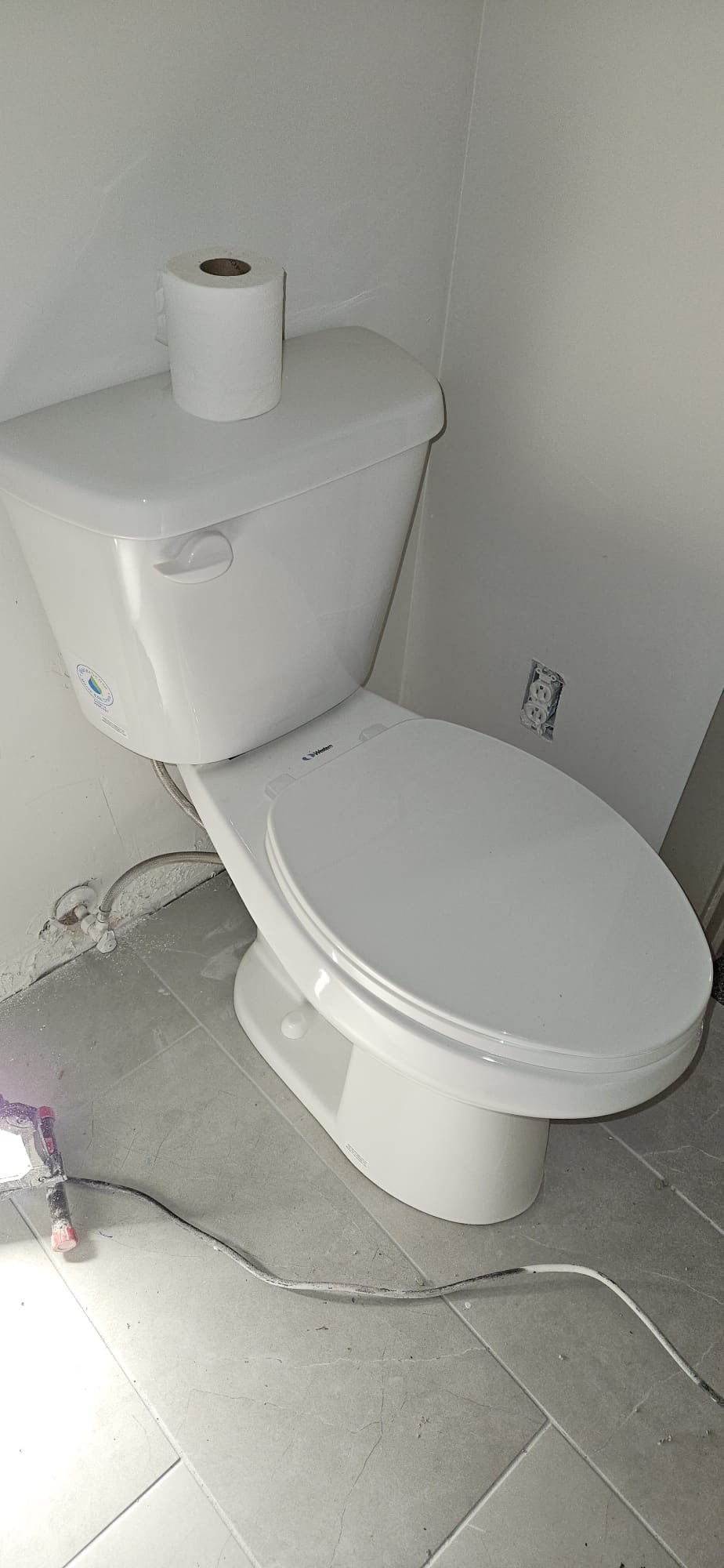 A low-profile steam radiator, symbolic of home comfort and warmth, stands ready to tackle winter's chill. Like a quick home remedy for a clogged tub or same-day disaster remediation, it represents efficient solutions for unexpected household challenges, ensuring a cozy and problem-free home environment.