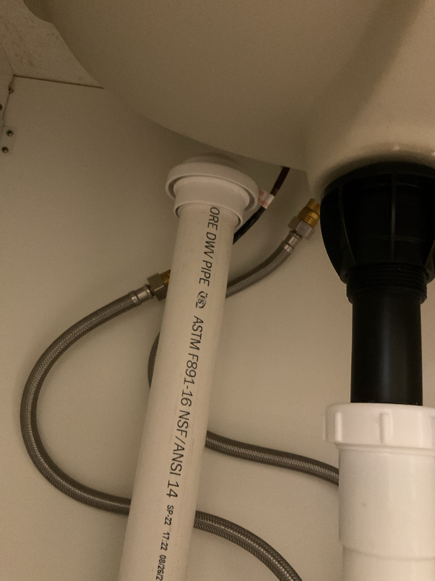 Image depicting residential flood odor removal troubleshooting. Possibly showcasing a sink removal tool used during the process. Related to residential flood odor removal estimate services. Focus on water damage restoration and odor control.