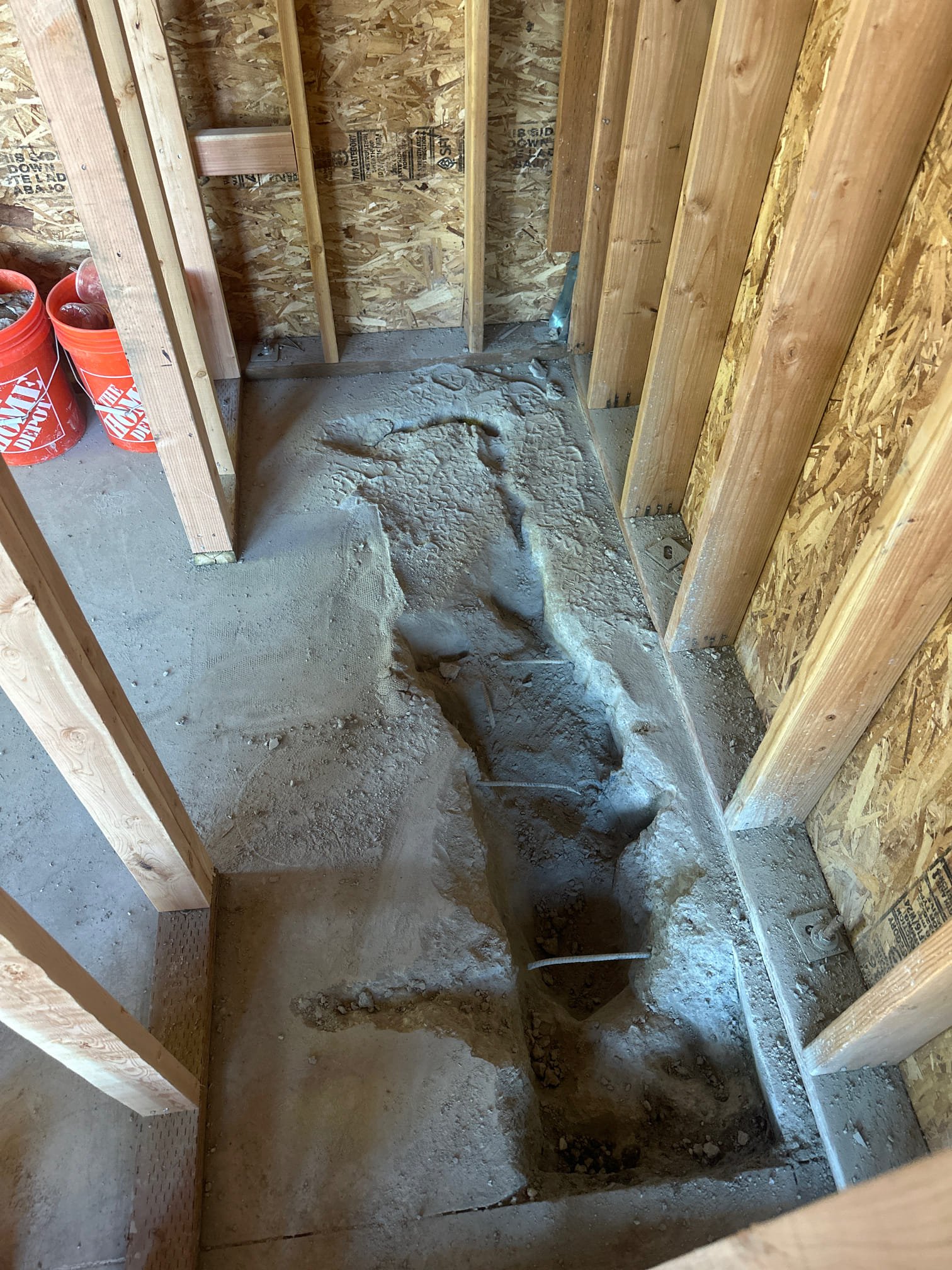 Image of a skilled plumber expertly handling a sewer main replacement, representing top-tier main sewer replacement service. Focus on quality workmanship and reliable solutions for sewer line issues.