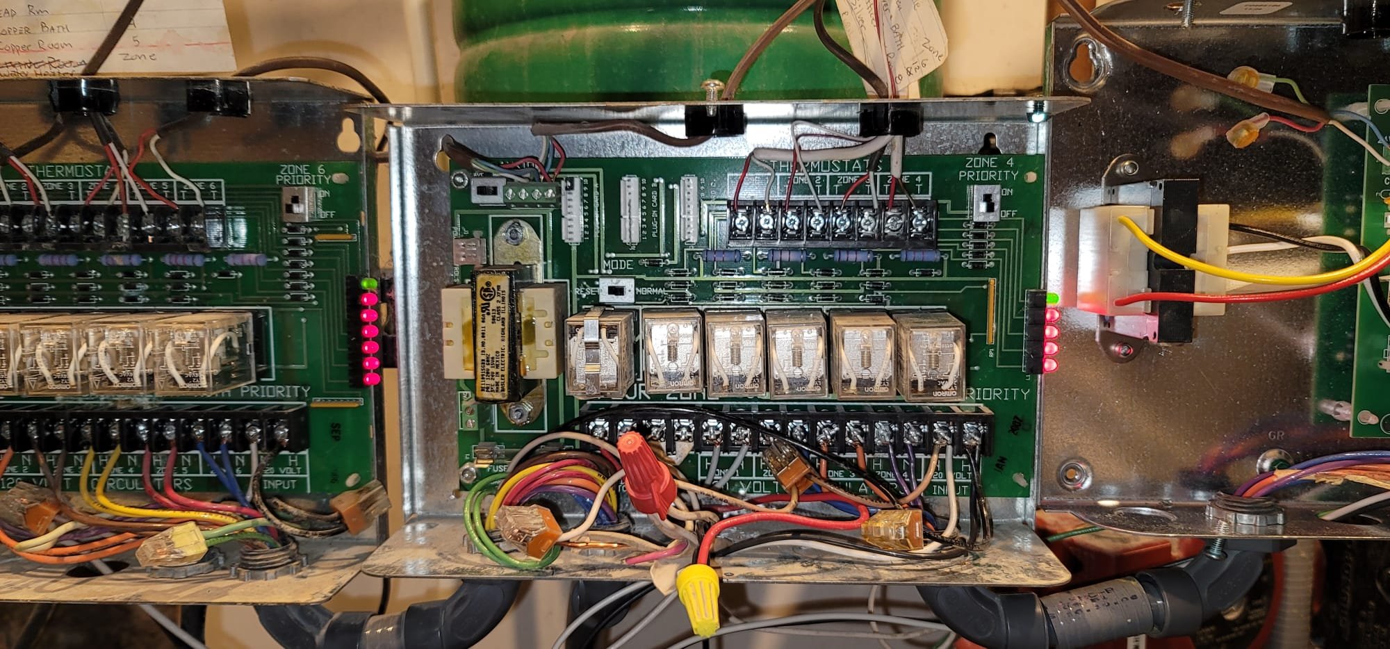 Image depicting a professional technician repairing a combi boiler in a residential home. Focus is on prompt, local boiler repair services for homeowners.