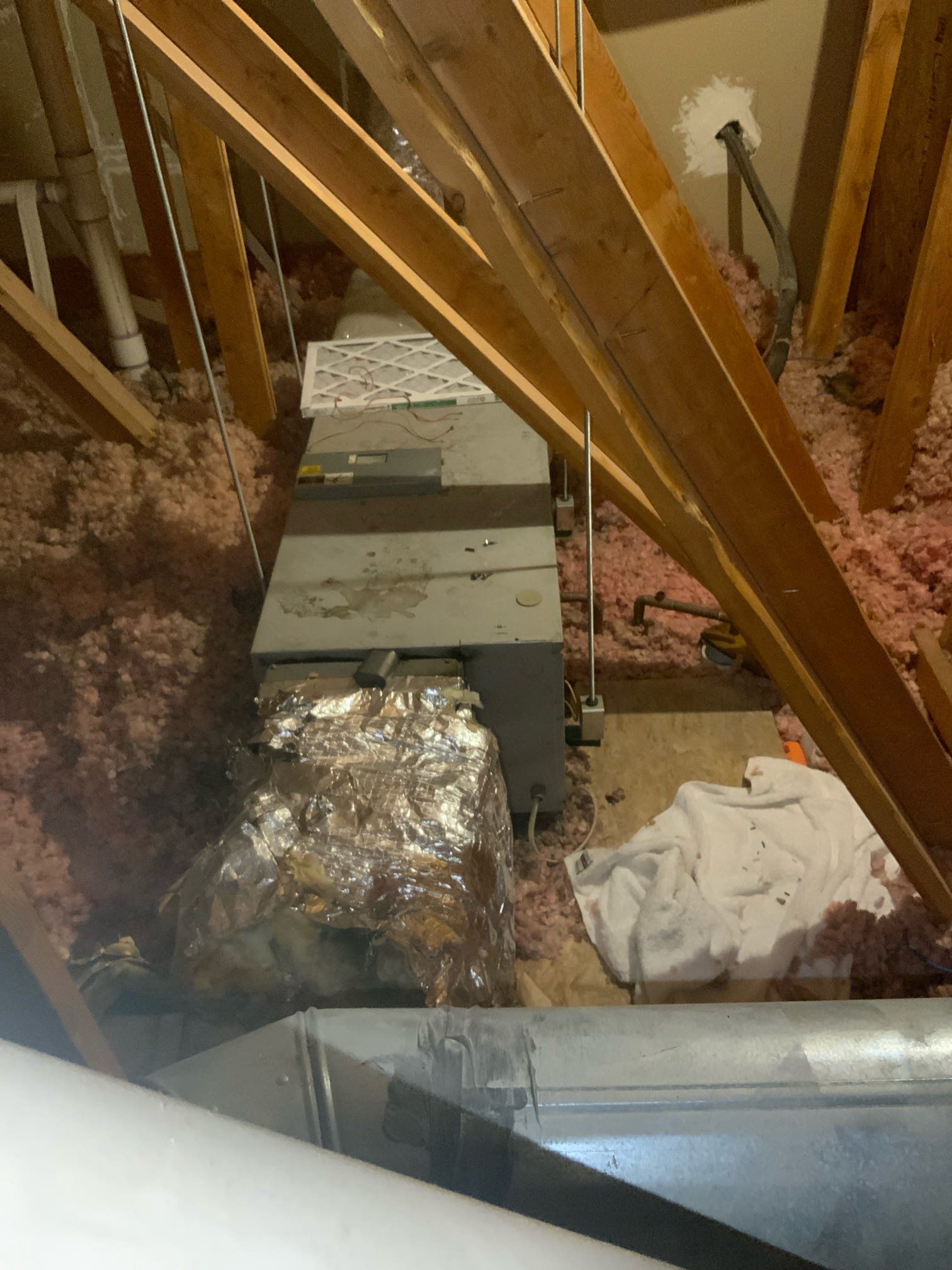 Frustrated homeowner surrounded by flood damage, symbolizing ineffective residential flood repair. The scene highlights the need for proper flood repair maintenance, much like unclogging a sink prevents plumbing disasters. Emphasizes the importance of professional and preventative solutions to avoid recurring water damage.