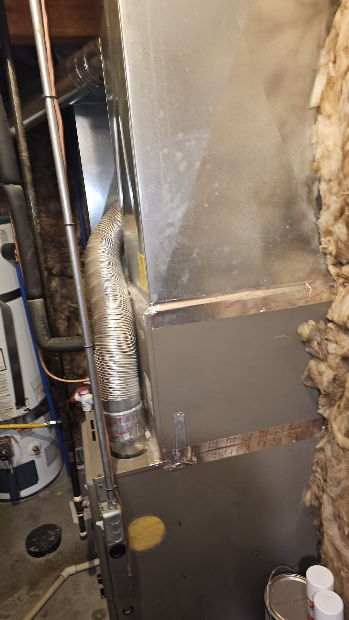 Image depicting AC installation or repair, possibly a technician working on a wall AC unit. Represents local AC companies offering services like AC replacement.