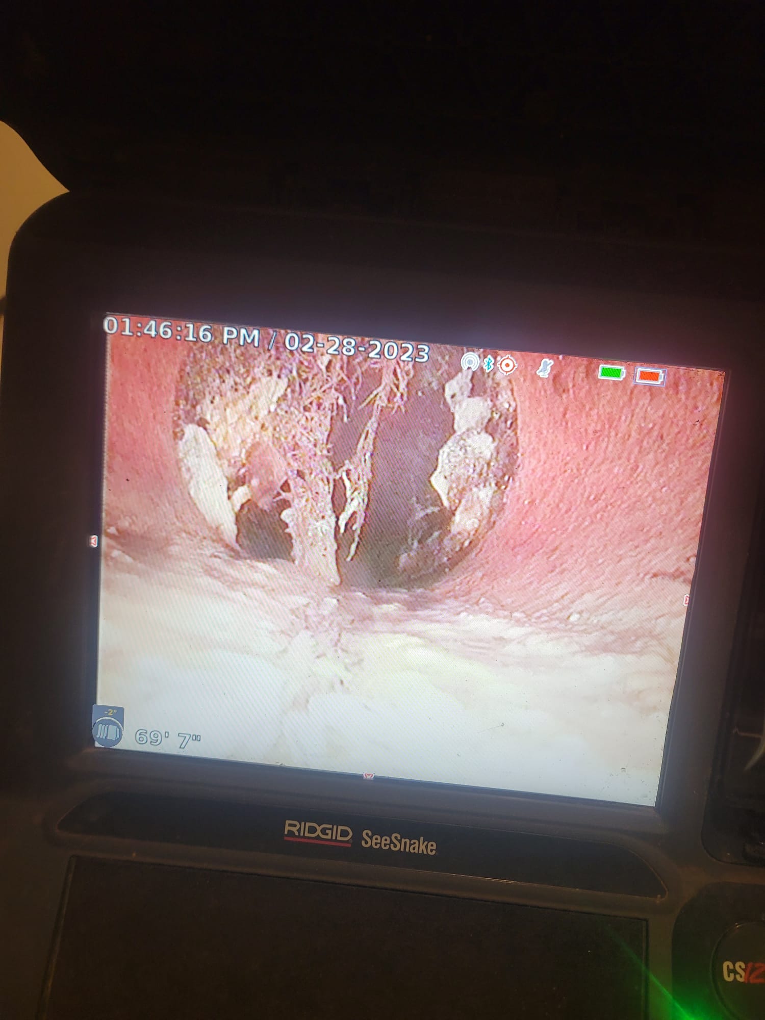 Image depicting commercial air conditioning maintenance. Professional HVAC technicians service an industrial AC unit, highlighting the expertise of an air conditioning installation company ensuring optimal performance and energy efficiency.