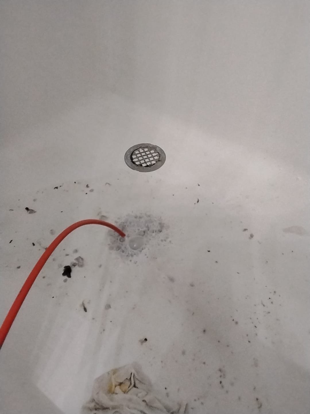 Aftermath of flooding: A water-damaged home is being cleaned up following a devastating flood. Flood cleaning and restoration efforts are underway to remove debris and sanitize the property, addressing the impacts of flooding flooding.