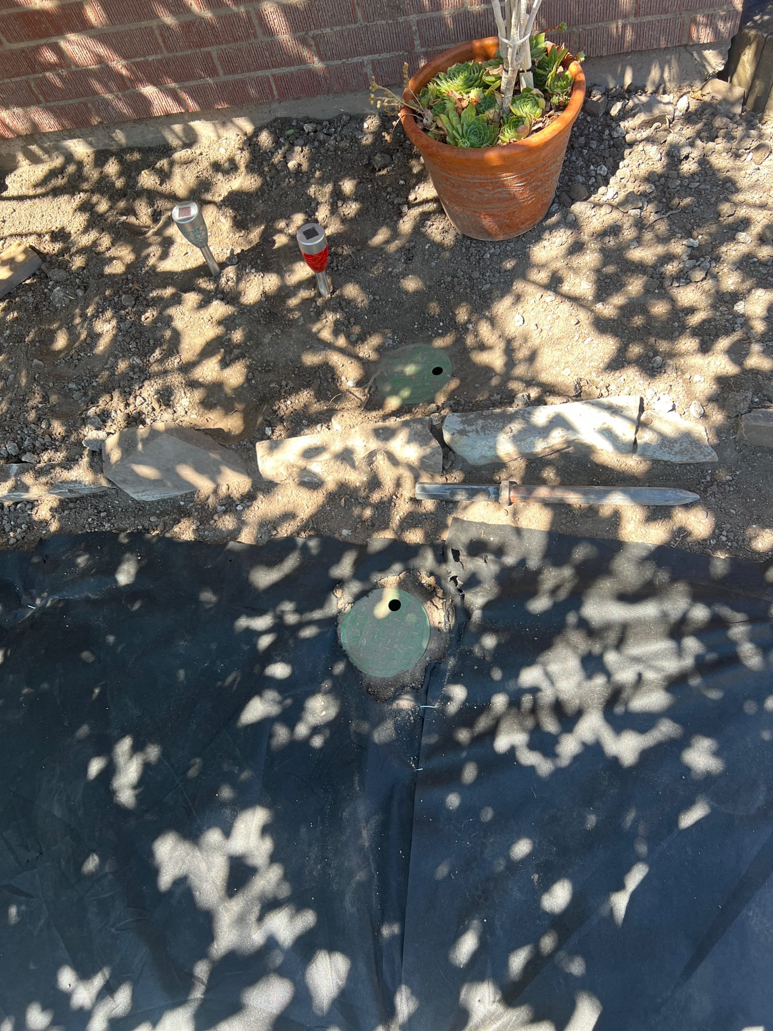 Image depicting slab leak repair, possibly showing a faucet wrench used to address plumbing issues. The scene may include a leaking faucet, highlighting the importance of professional leak detection and repair services to prevent structural damage from hidden water leaks under concrete slabs.