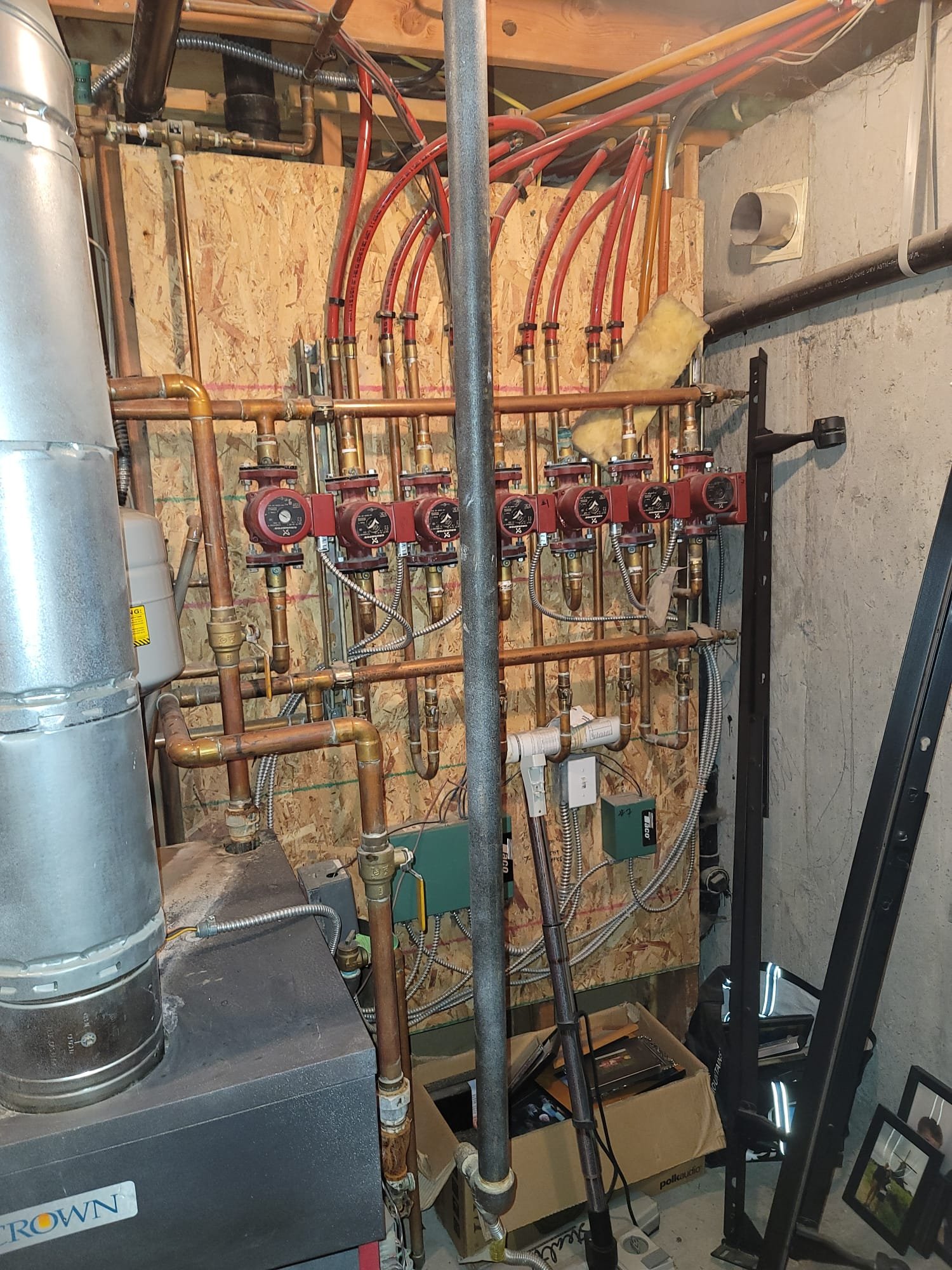 A collection of outdoor wood boilers, highlighting boiler and furnace repair, and water boiler repair services nearby. Image suggests solutions for heating and water issues.