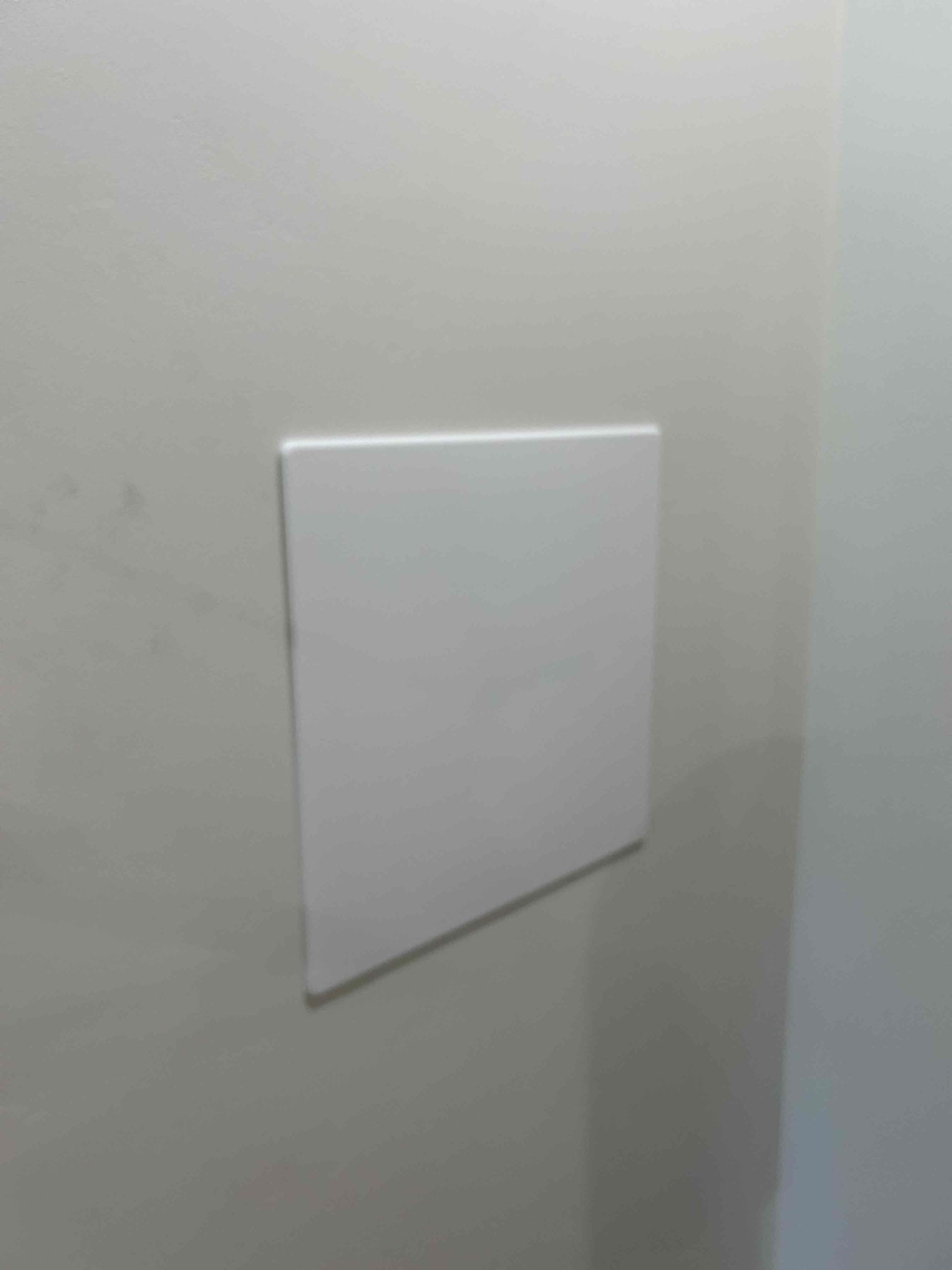 Modern steel bathroom featuring clean lines and minimalist design, potentially affected by moisture issues. An image representing common challenges addressed during bathroom remodels, including mold growth and restoration troubleshooting in residential settings. Ideal for articles on estimating remodel costs and resolving mold problems.