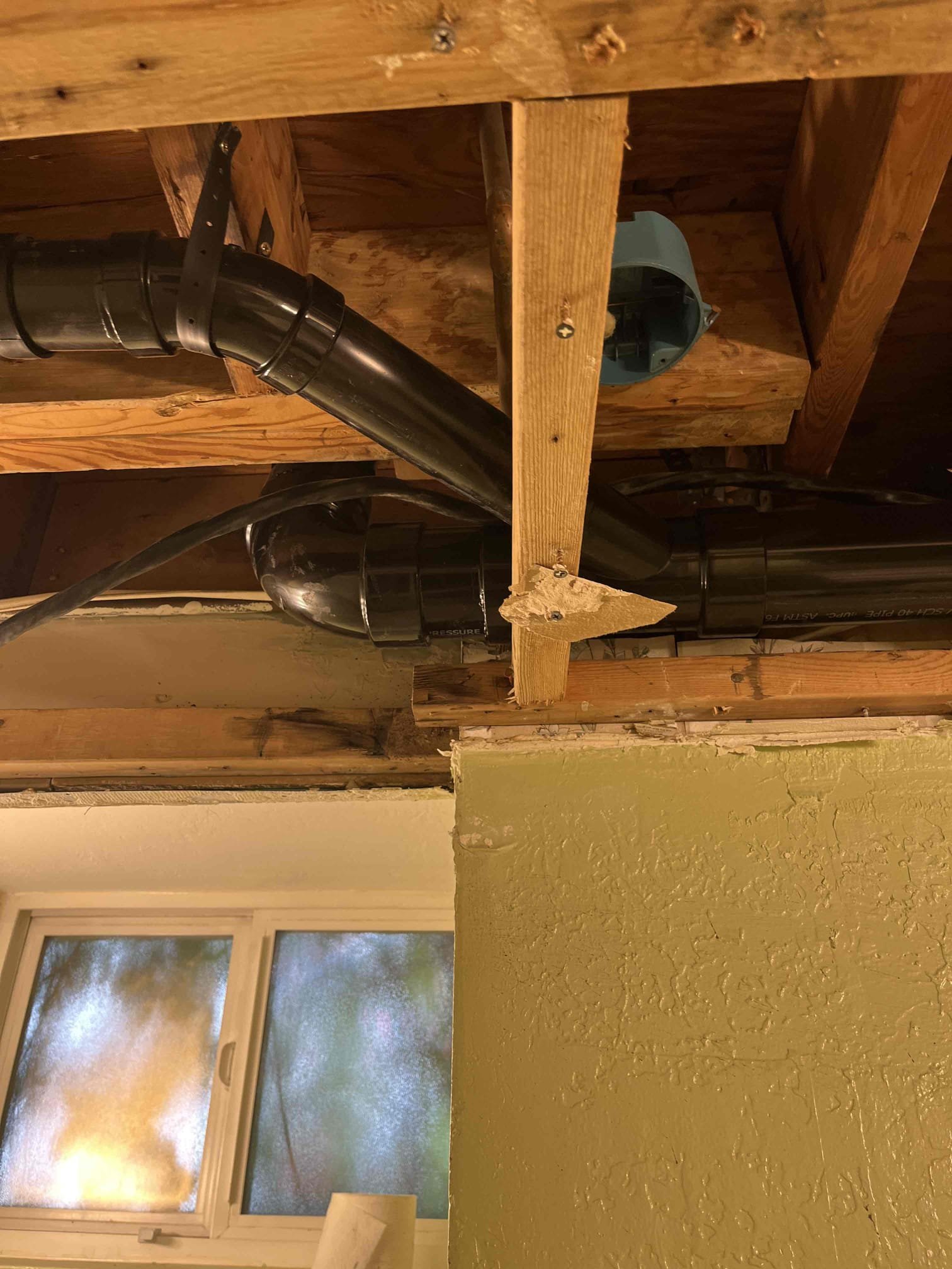 Image depicting sewer gas detectors used in a home setting, highlighting their importance in residential sewer inspection. The detectors are shown alongside equipment commonly used in sewer inspections, such as a Ridgid camera inspection system, to emphasize the comprehensive approach to ensuring home safety and identifying potential sewer line issues.