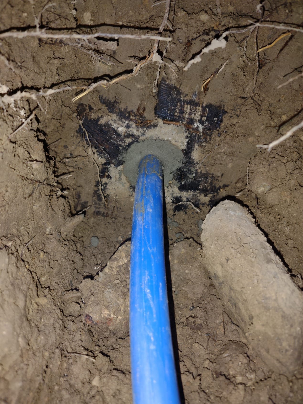 Ceiling water damage recovery service addressing issues stemming from kitchen sink clogs. Professional solutions for water damage repair and restoration, preventing further structural problems.