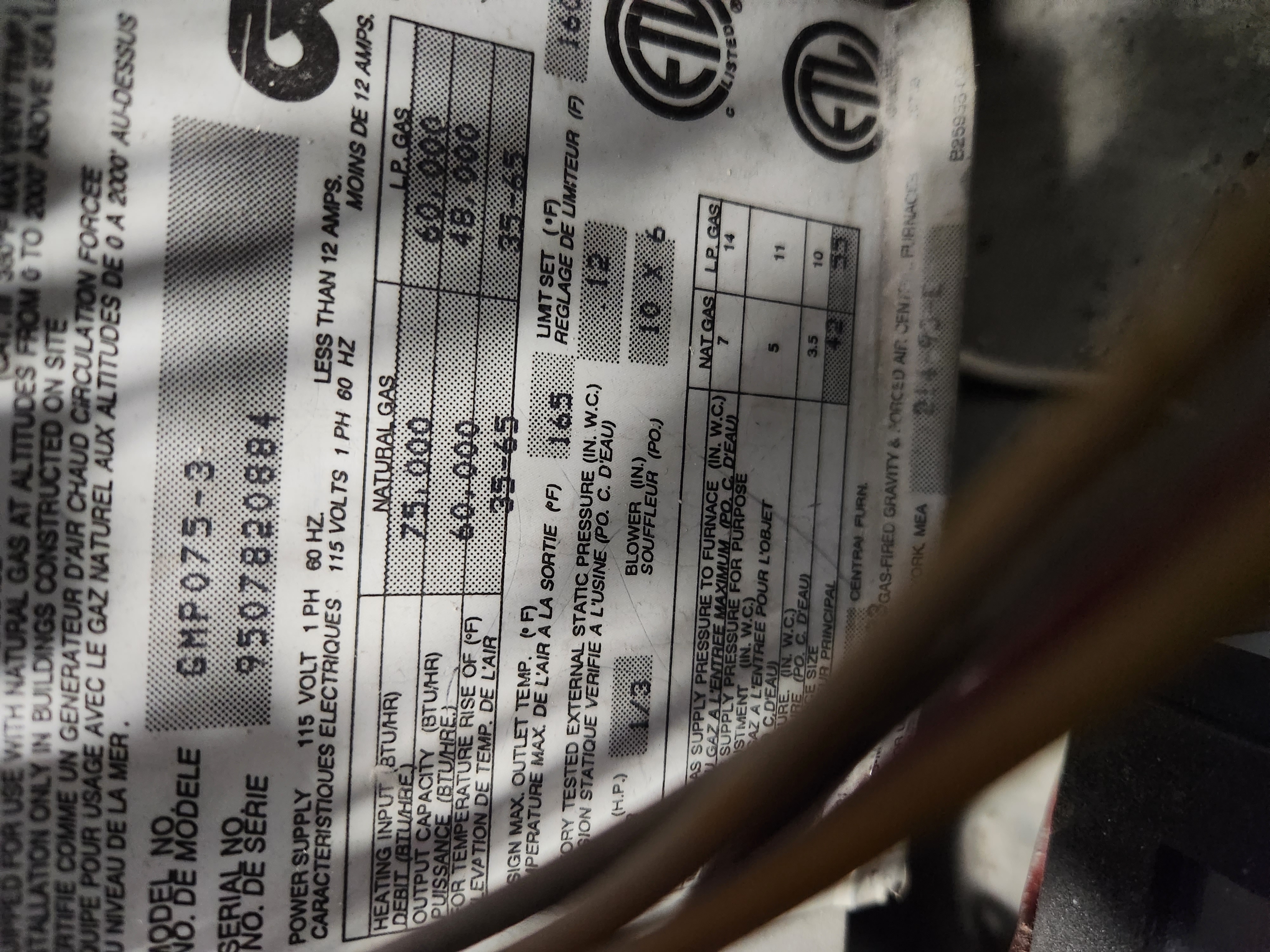 Image depicting the process of adding air conditioning to an existing central furnace heating system. Possibly referencing a Goodman furnace troubleshooting manual for installation or repair guidance. Focus on HVAC integration and home cooling solutions.