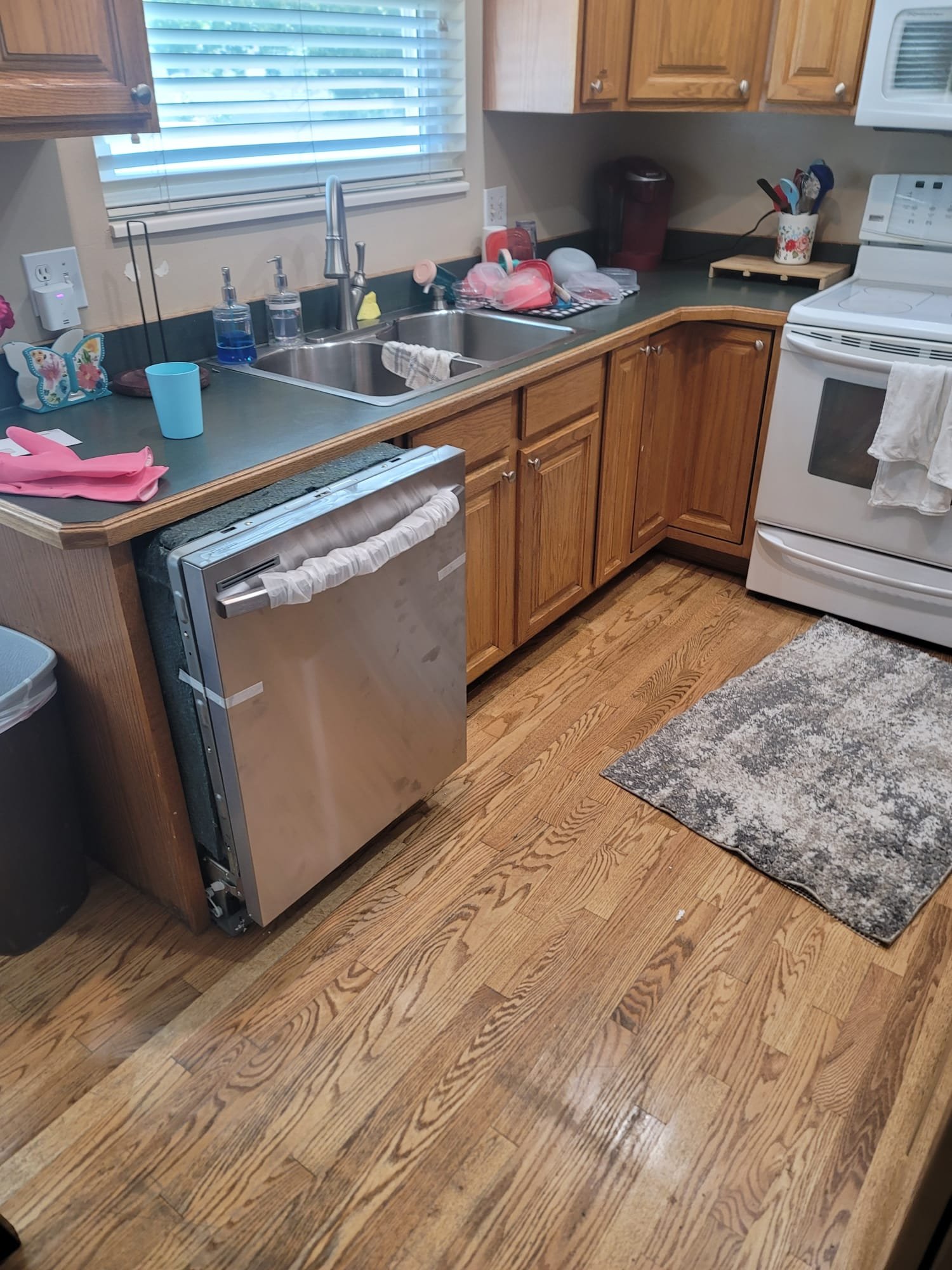 Image depicting the aftermath of a home disaster, highlighting potential restoration costs. Concepts of DIY fixes, like resetting a sink disposal, versus professional disaster restoration inspection are visually represented to illustrate cost-saving options and when expert help is necessary.