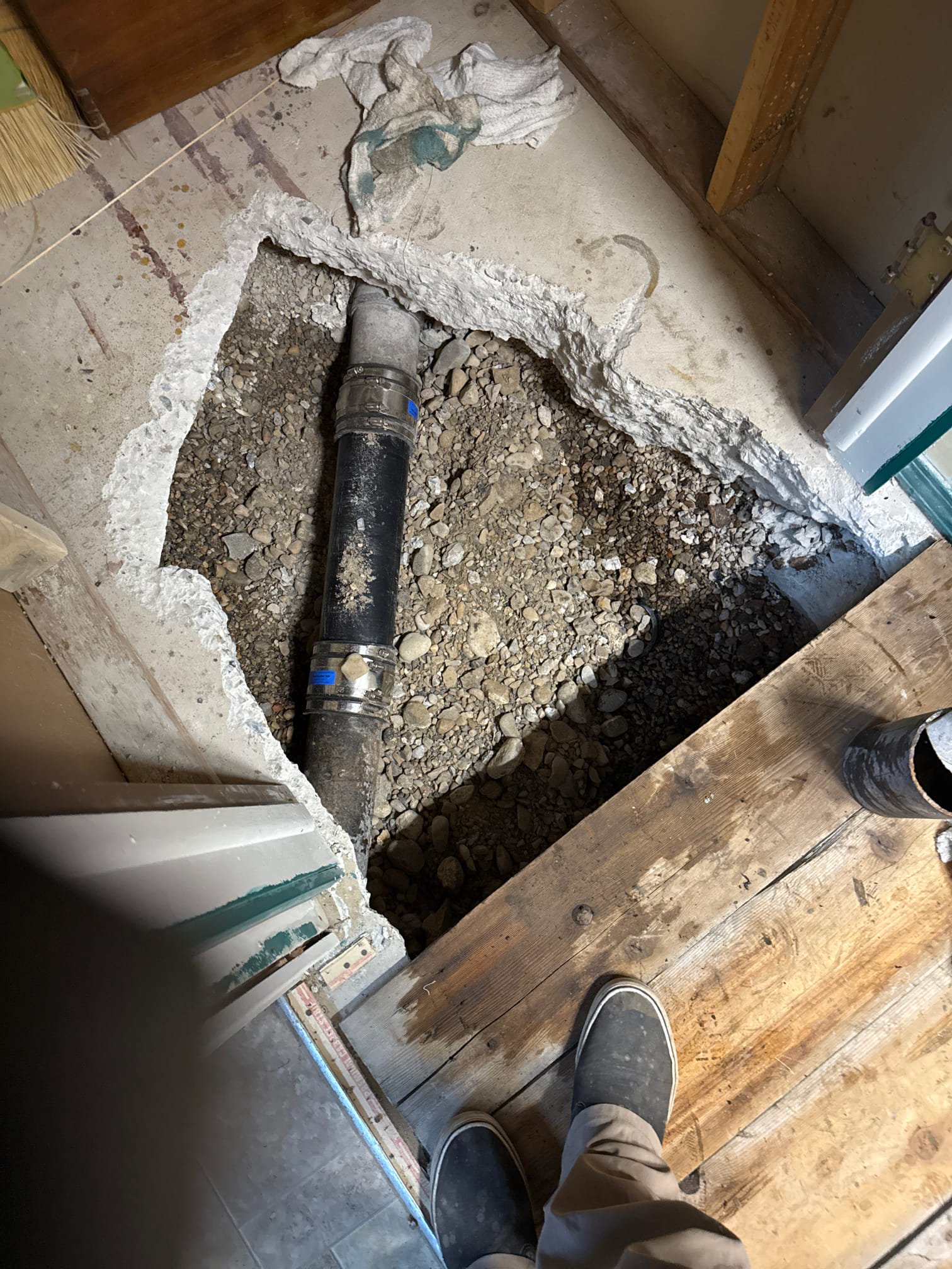 Image depicts ceiling drywall being repaired, a common task for ceiling water damage repair experts. Addressing water damage promptly helps control ceiling water damage repair cost by preventing further structural issues.